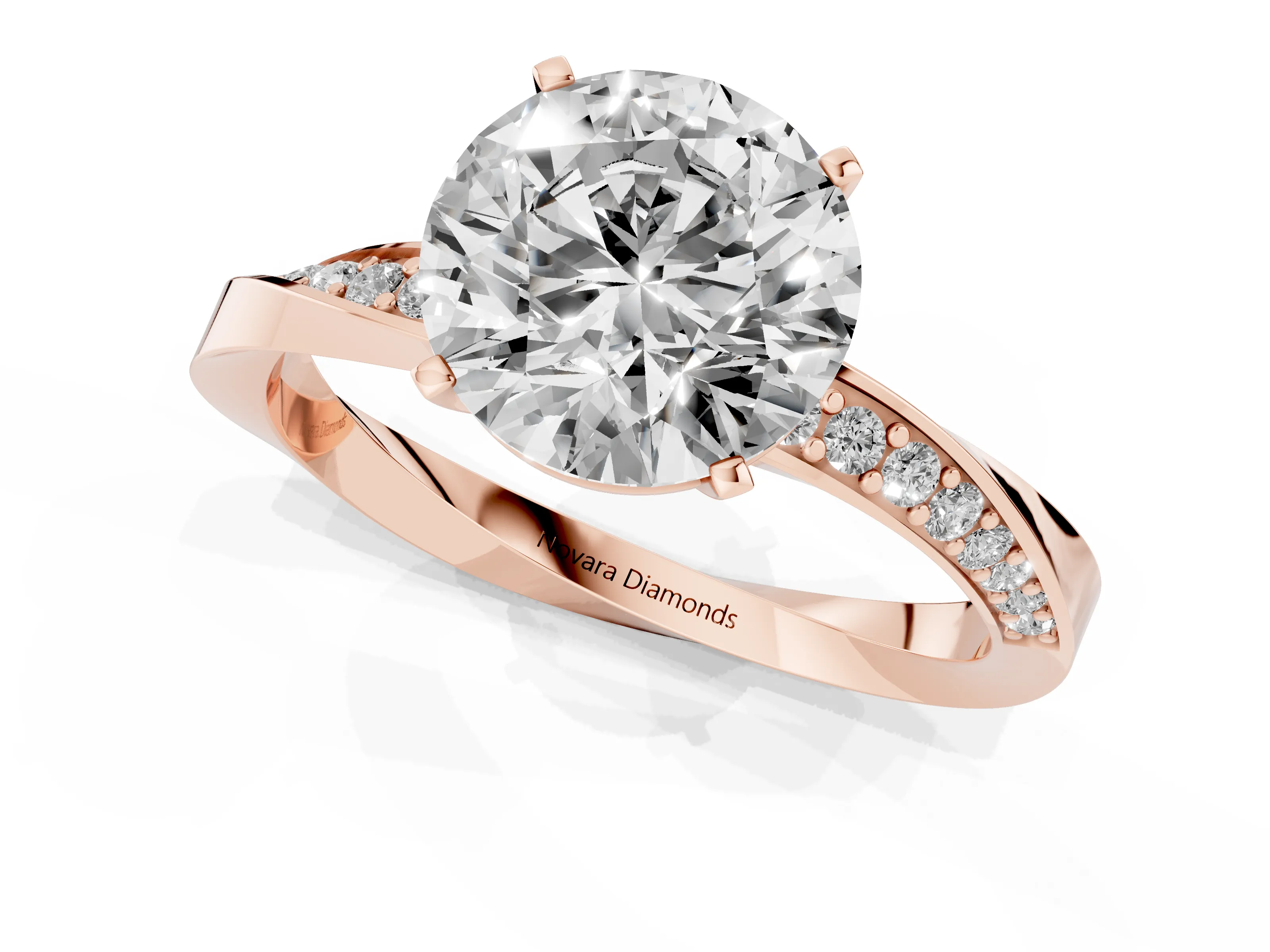 Round Cut Diamond Engagement Ring Set in Rose gold with Side Stone Accents and Prong Setting
