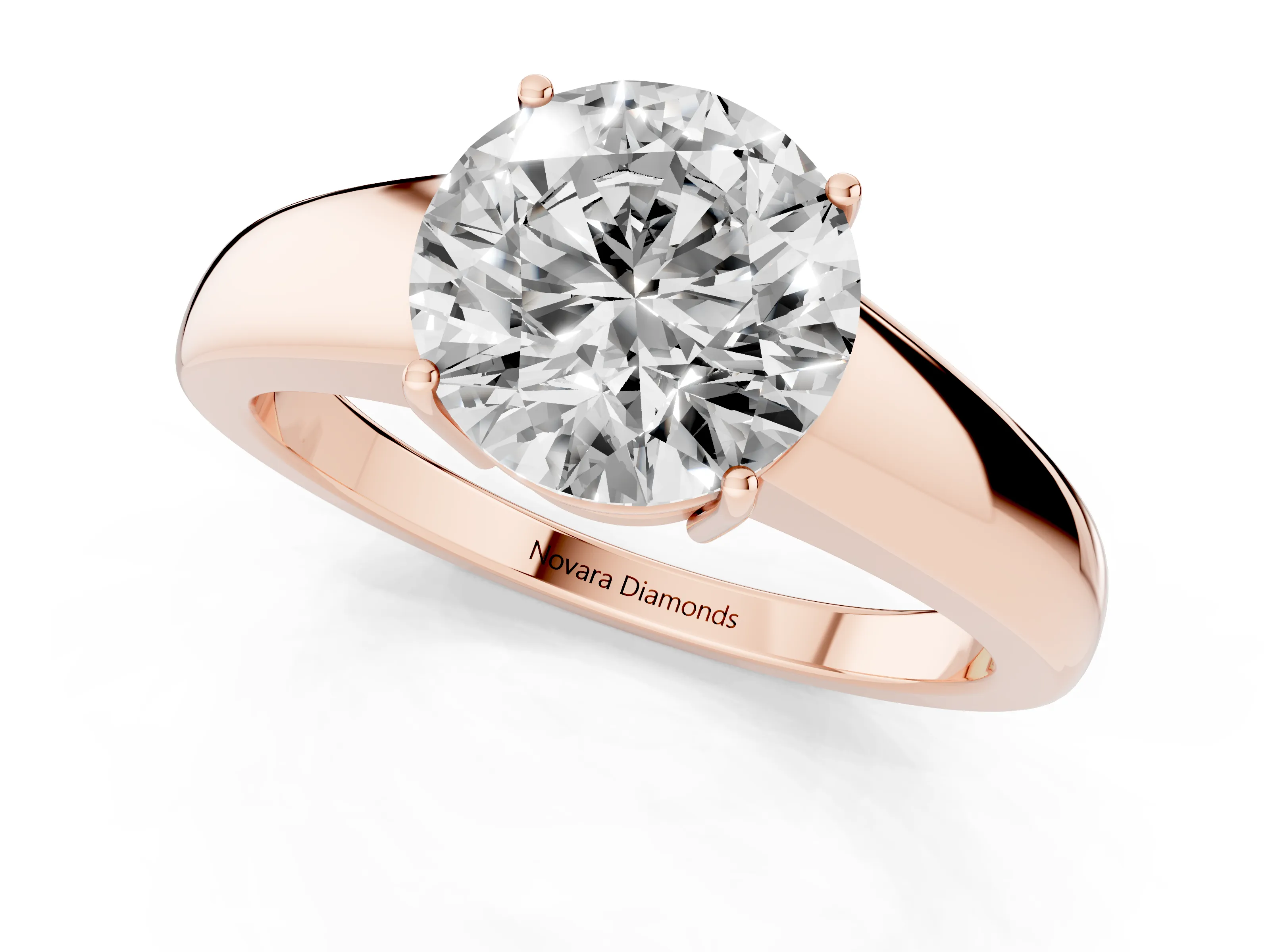 Round Cut Diamond Solitaire Ring Set in Rose gold with Tapered Band and Prong Setting