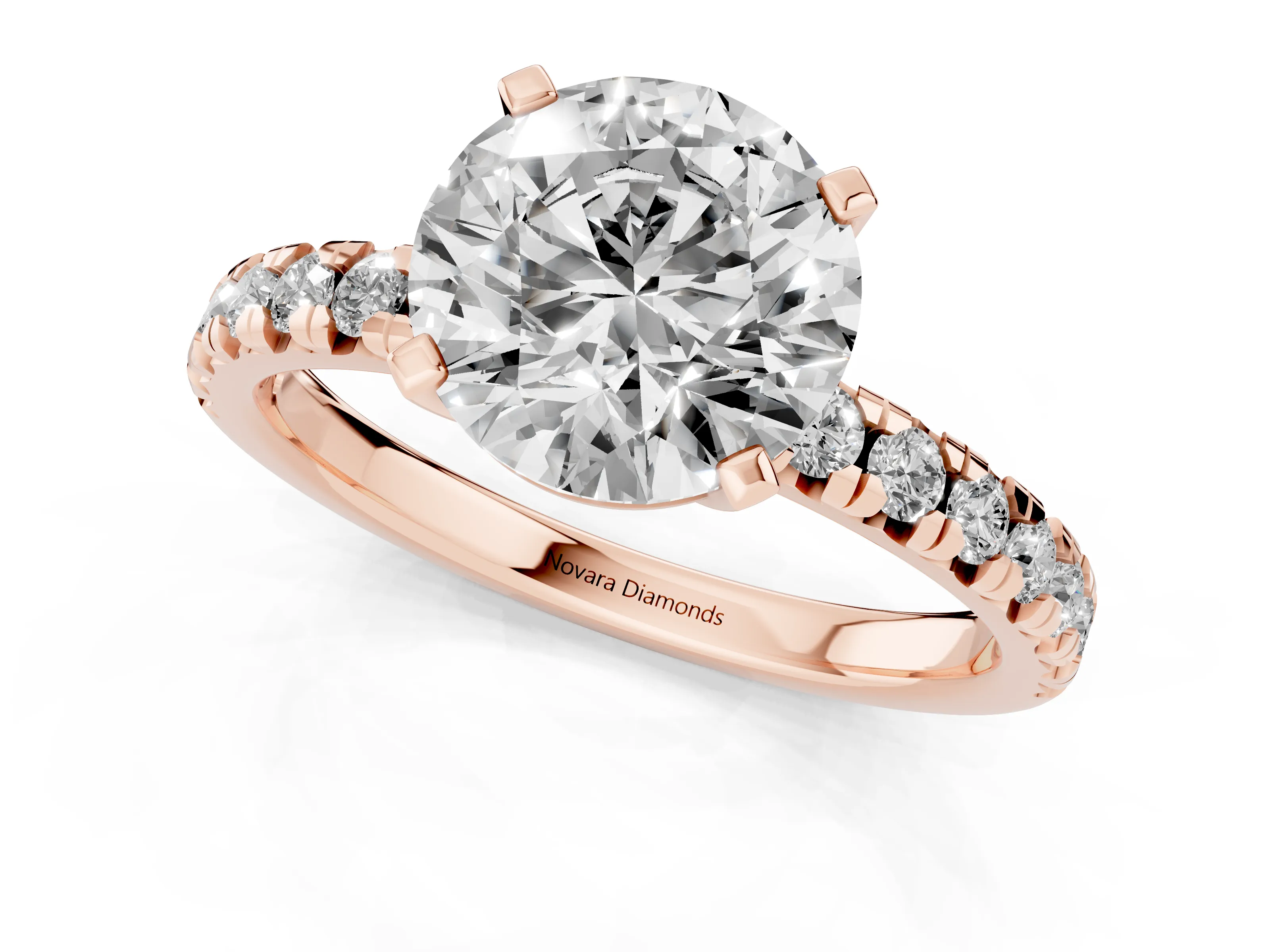 Round Cut Diamond Solitaire Pavé Engagement Ring Set in Rose gold with Round Band and Prong Setting
