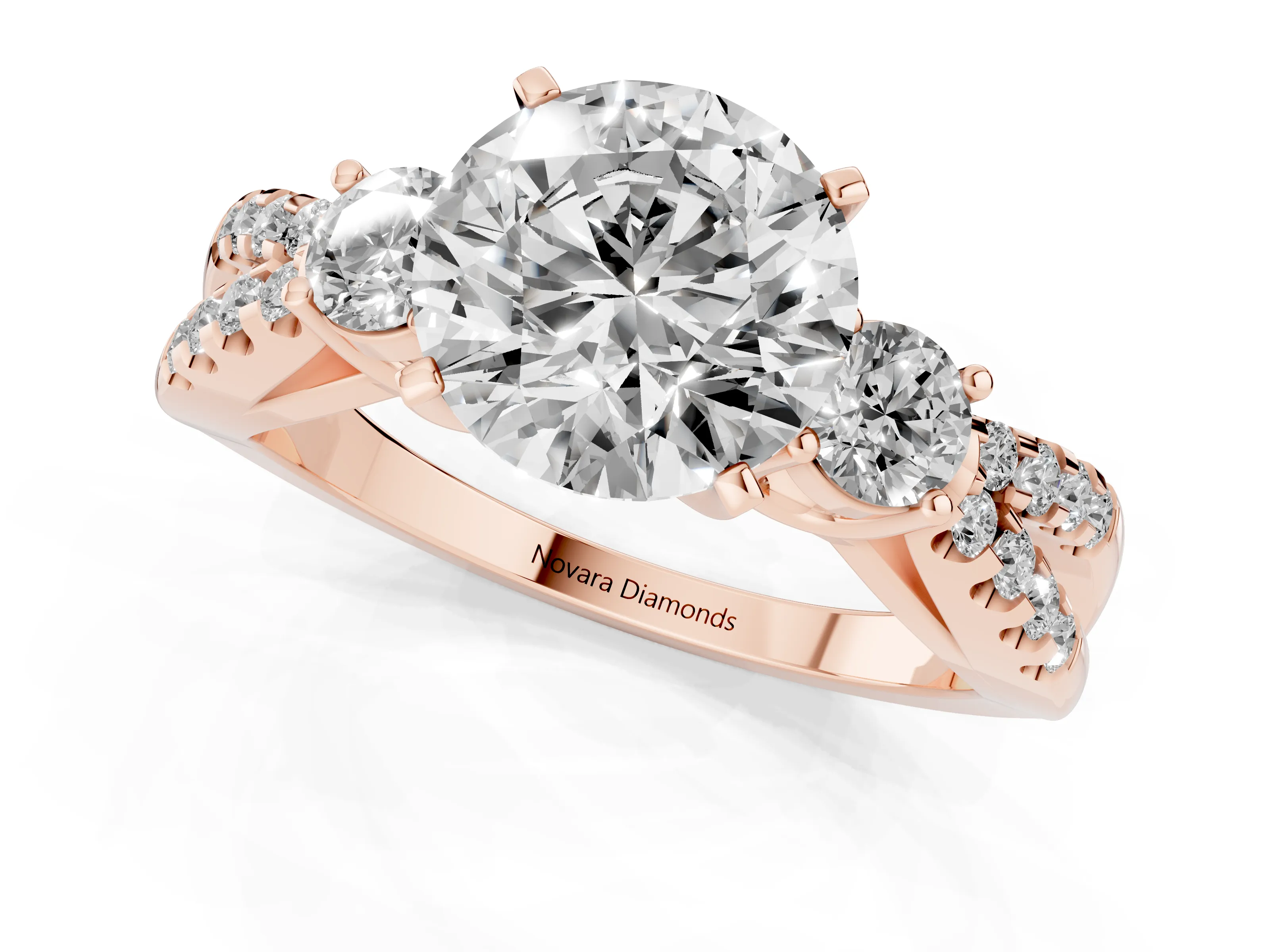 Round Cut Diamond Three-Stone Ring Set in Rose gold with Pavé Split Shank and Prong Setting