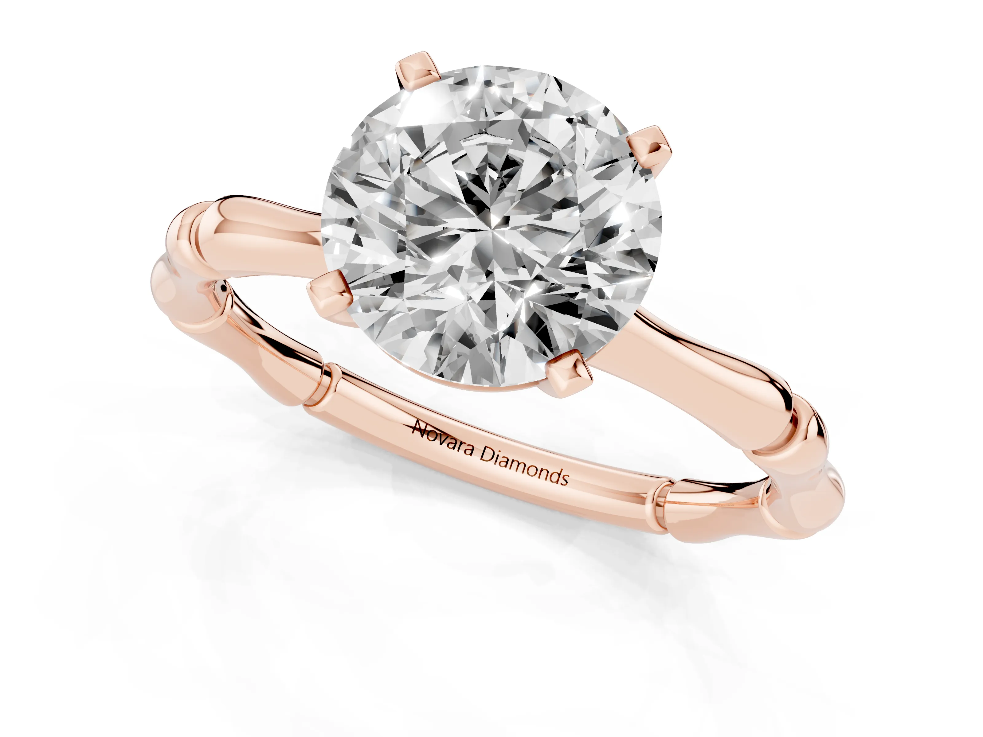 Round Cut Diamond Solitaire Ring Set in Rose gold with Bamboo Band and Prong Setting