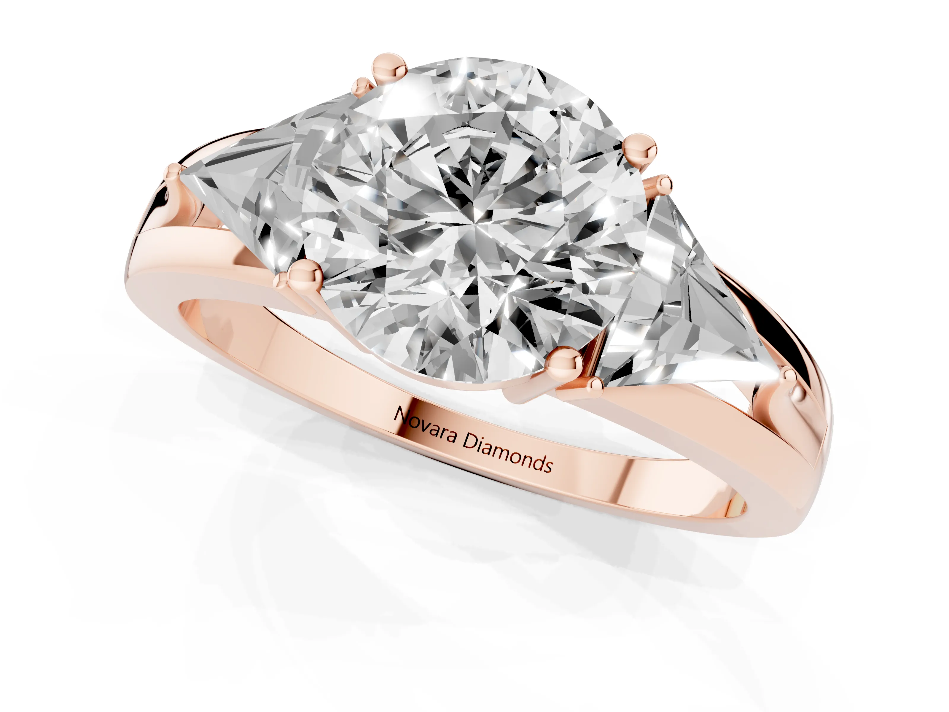 Round Cut Diamond Three-Stone Ring Set in Rose gold with Trillion Side Stones and Split Shank
