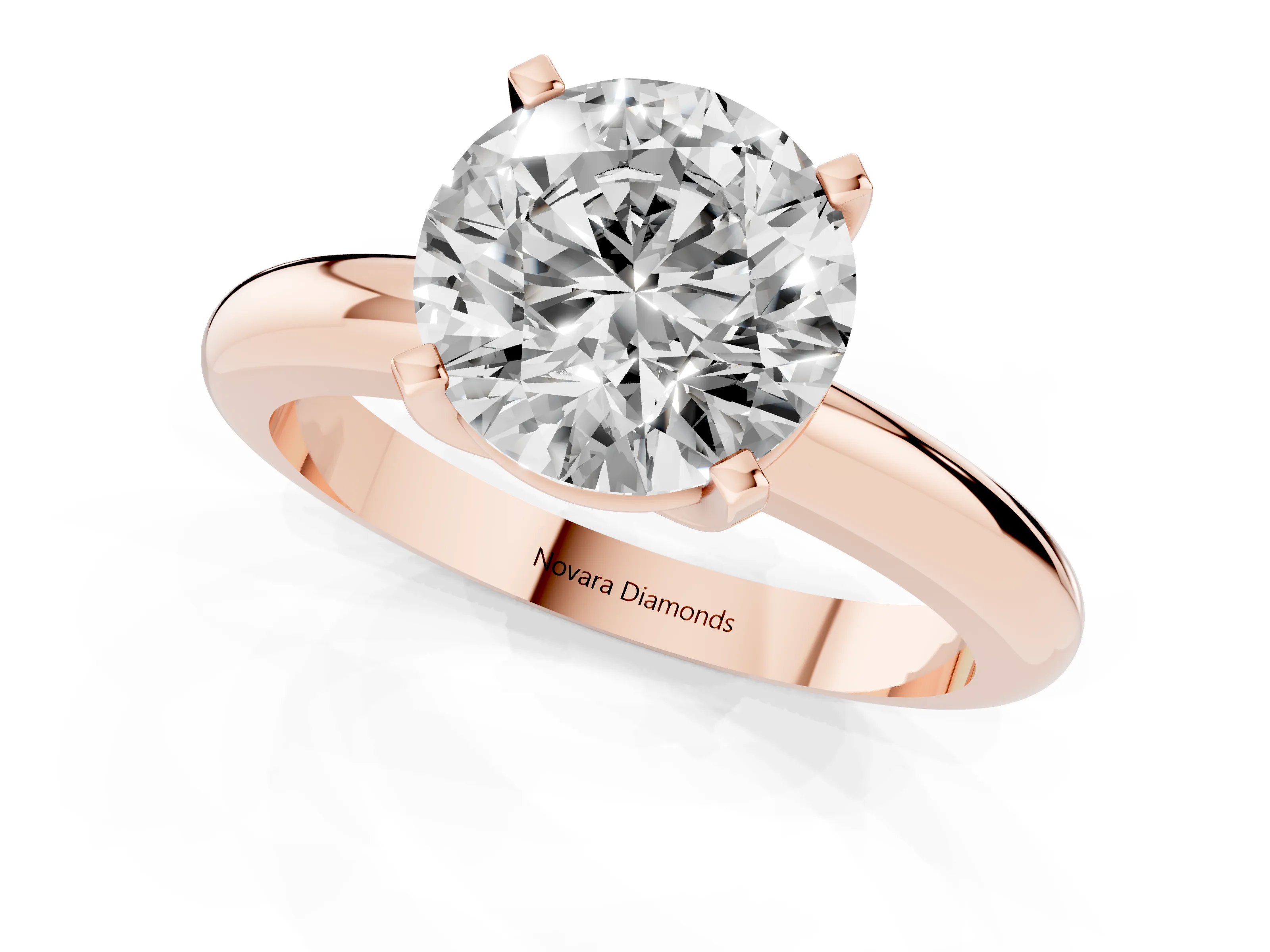 Round Cut Diamond Solitaire Engagement Ring Set in Rose gold with Round Band and Prong Setting