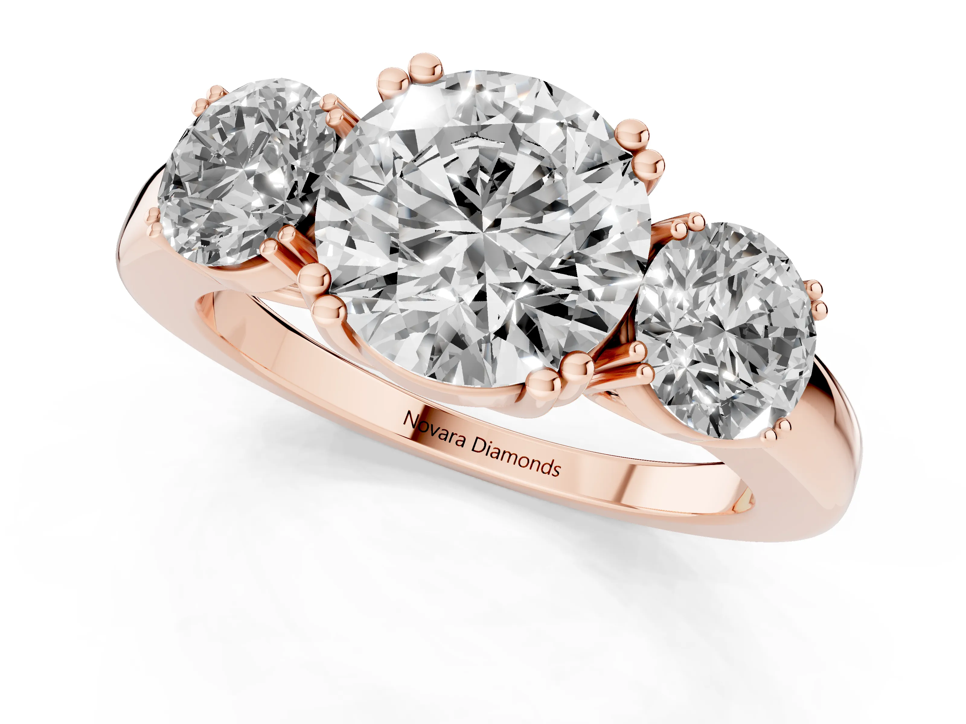 Round Cut Diamond Three-Stone Ring Set in Rose gold with Polished Channel-Set Band