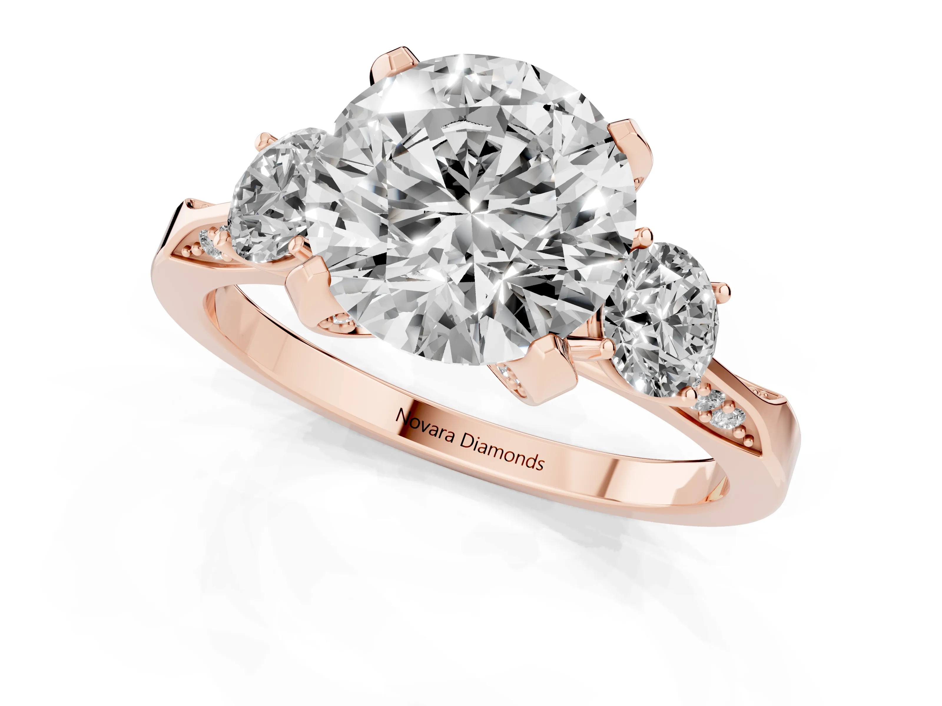Round Cut Diamond Three-Stone Ring Set in Rose gold with Pavé Band and Smaller Side Stones
