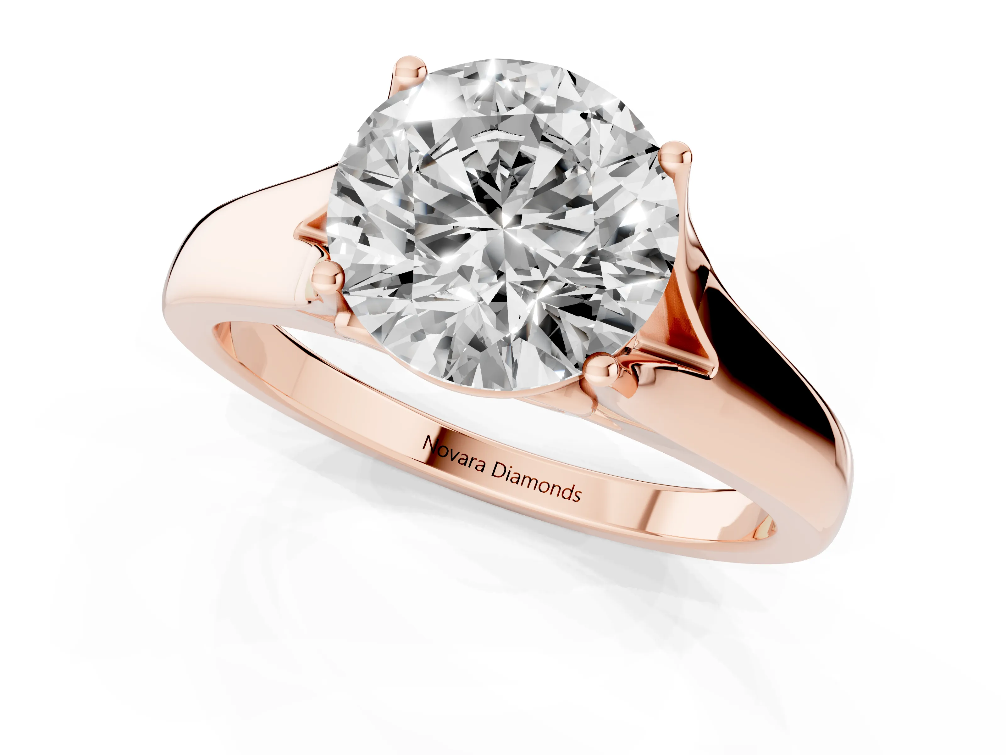 Round Cut Diamond Solitaire Ring Set in Rose gold with Arched Cathedral Band and Prong Setting