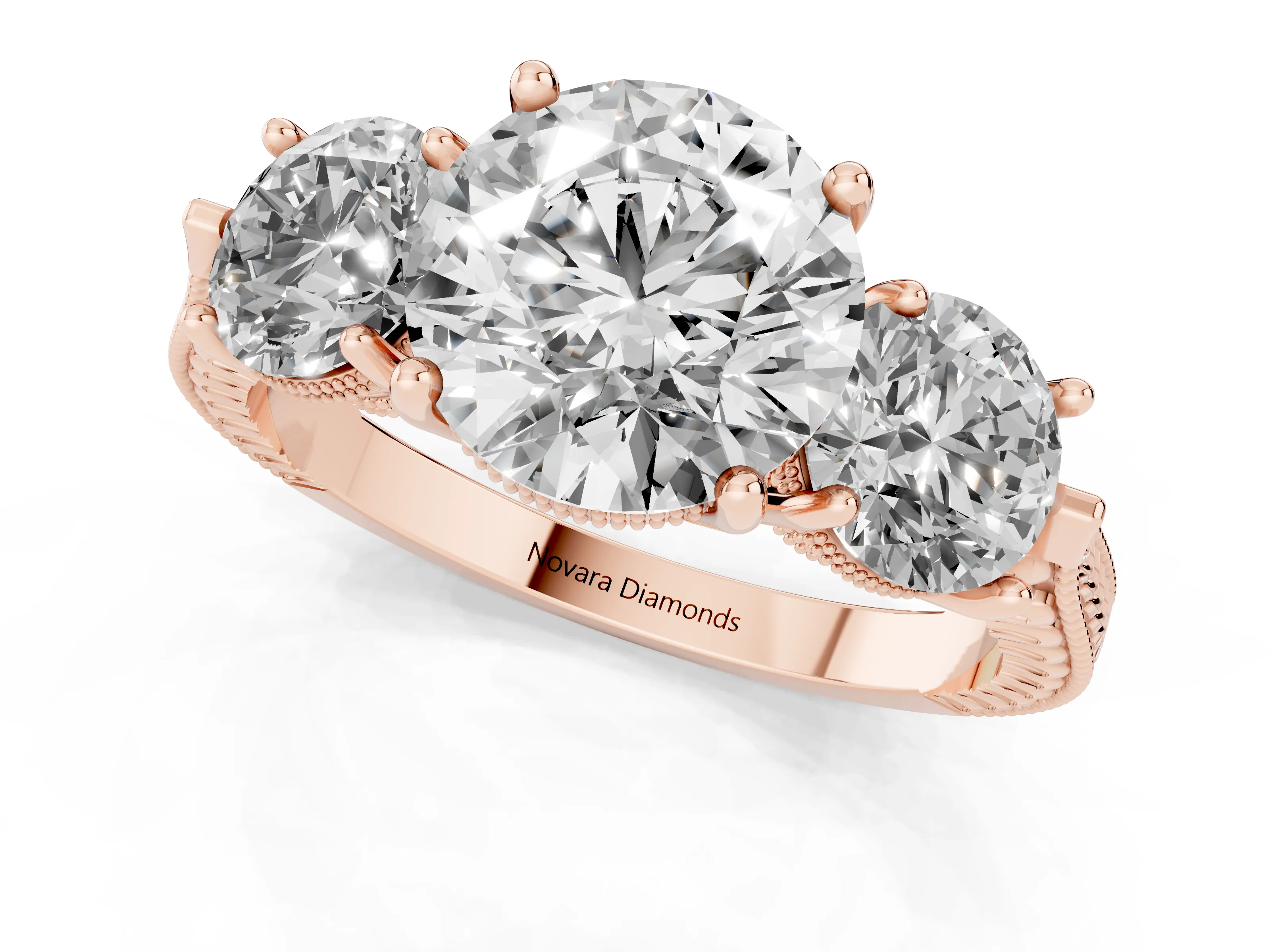 Round Cut Diamond Three-Stone Ring Set in Rose gold with Milgrain Band