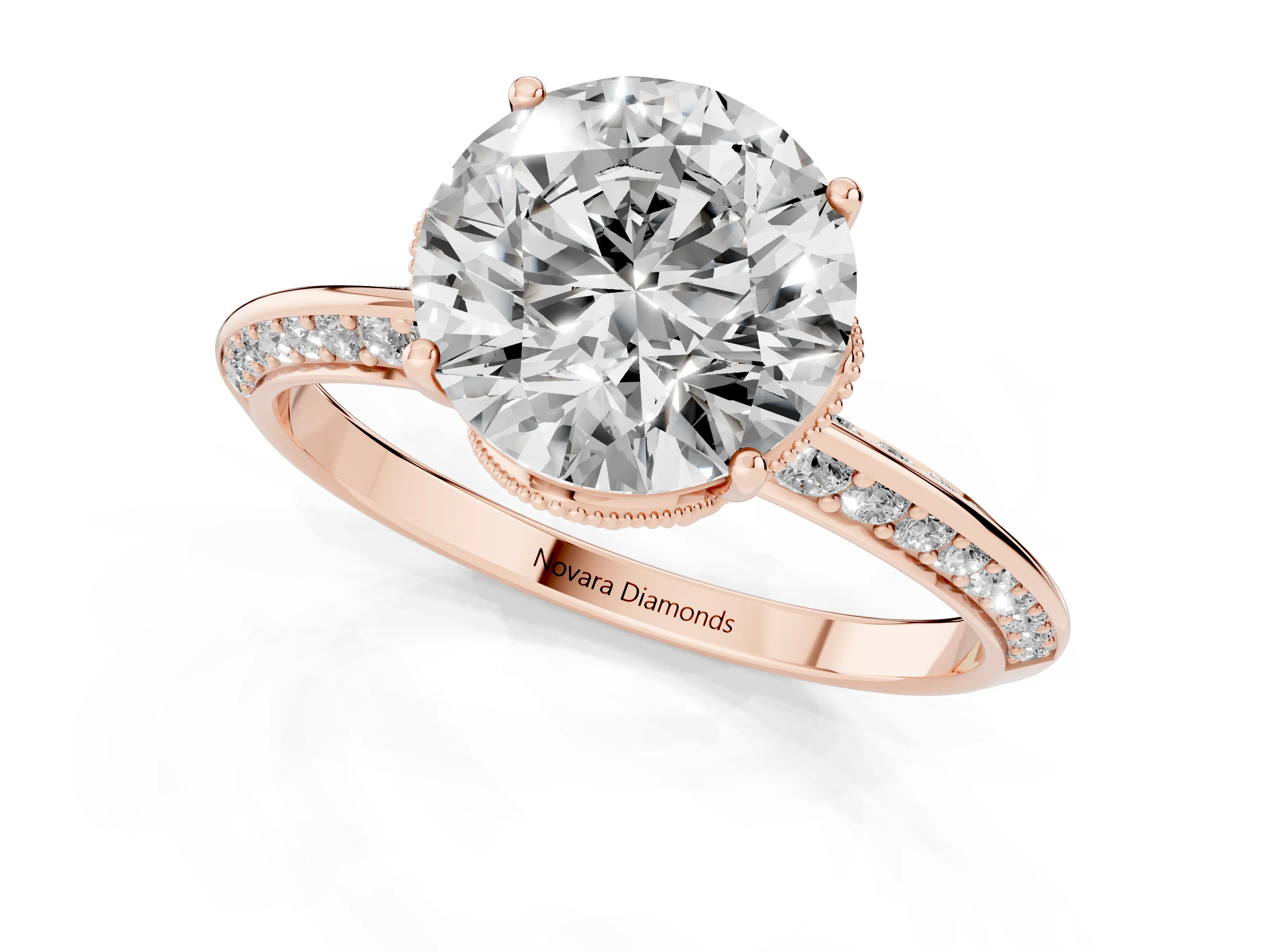 Round Cut Diamond Solitaire Engagement Ring Set in Rose gold with Pavé Split Shank and Prong Setting