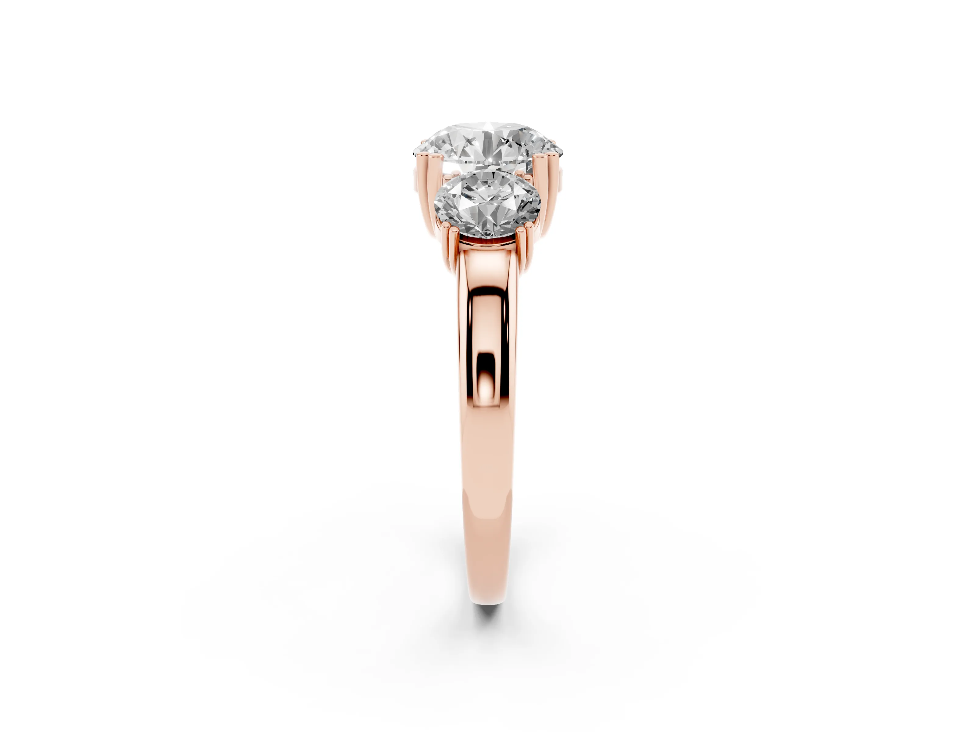 Round Cut Diamond Three-Stone Ring Set in Rose gold with Polished Channel-Set Band