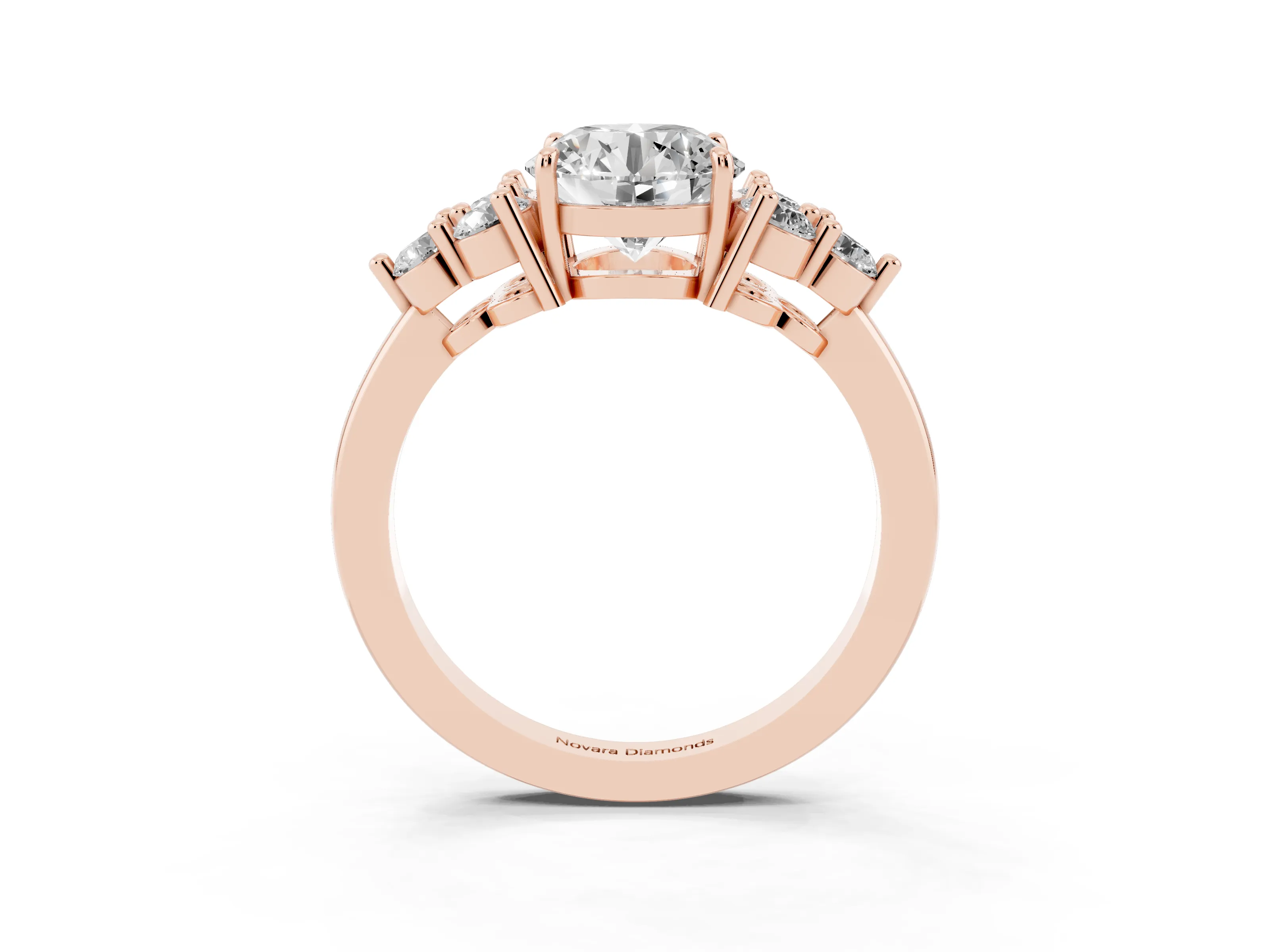 Round Cut Diamond Solitaire Ring Set in Rose gold with Cluster Accents on Each Side