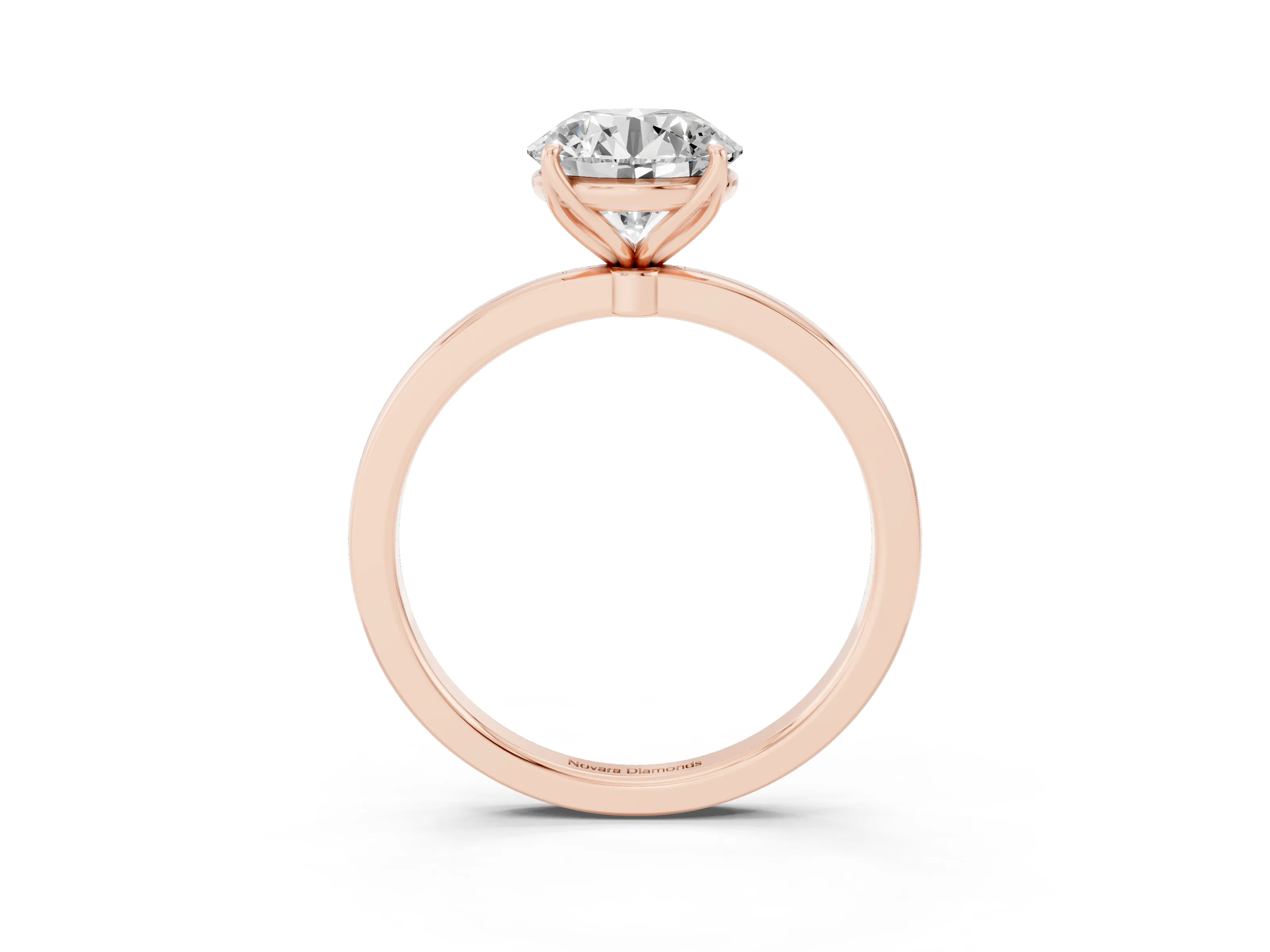 Round Cut Diamond Solitaire Ring Set in Rose gold with Prong Setting and Thin Polished Band