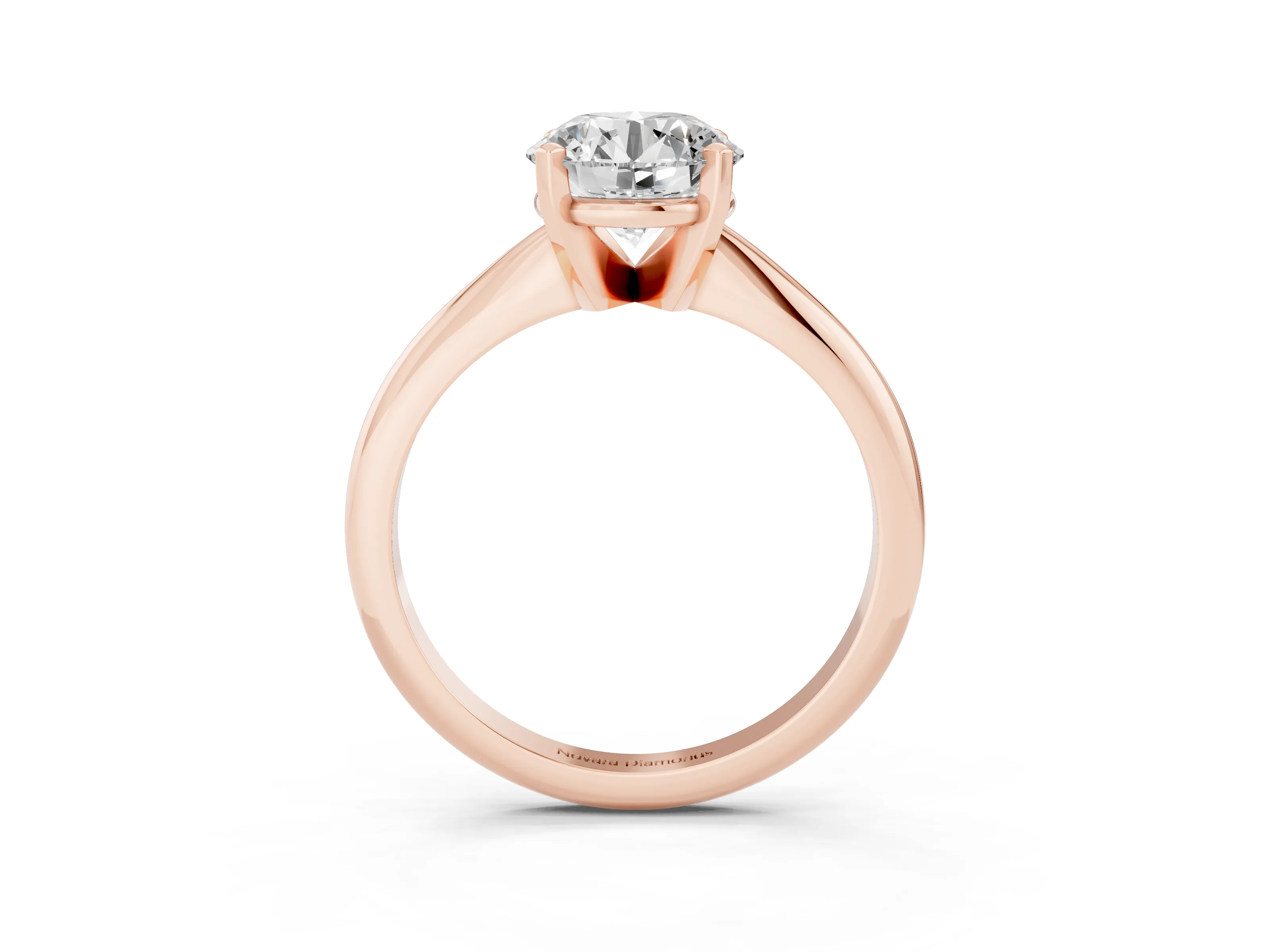 Round Cut Diamond Solitaire Ring Set in Rose gold with Prong Setting on a Plain Round Band