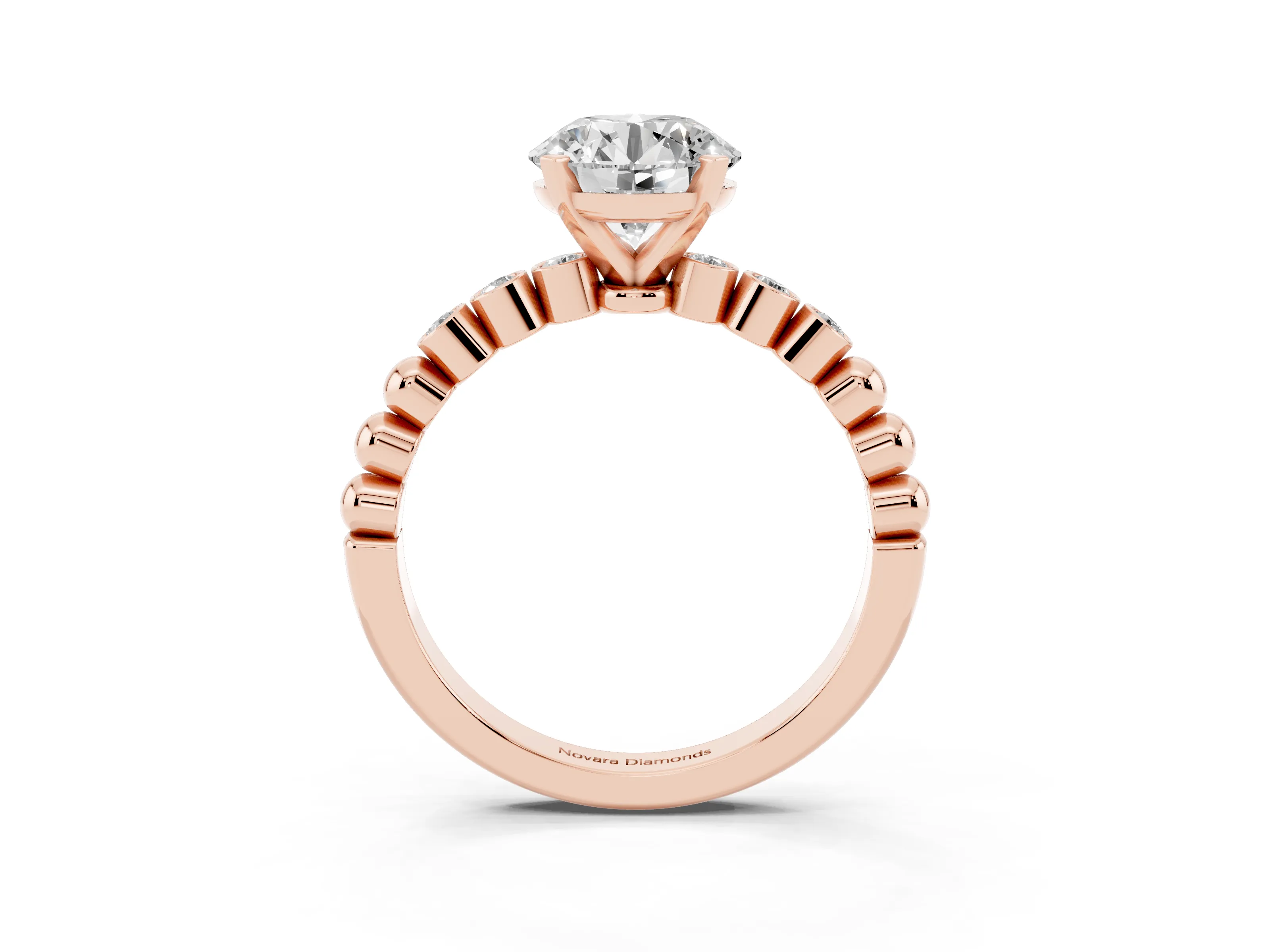Round Cut Diamond Solitaire Engagement Ring Set in Rose gold with Bezel Accents on Beaded Band