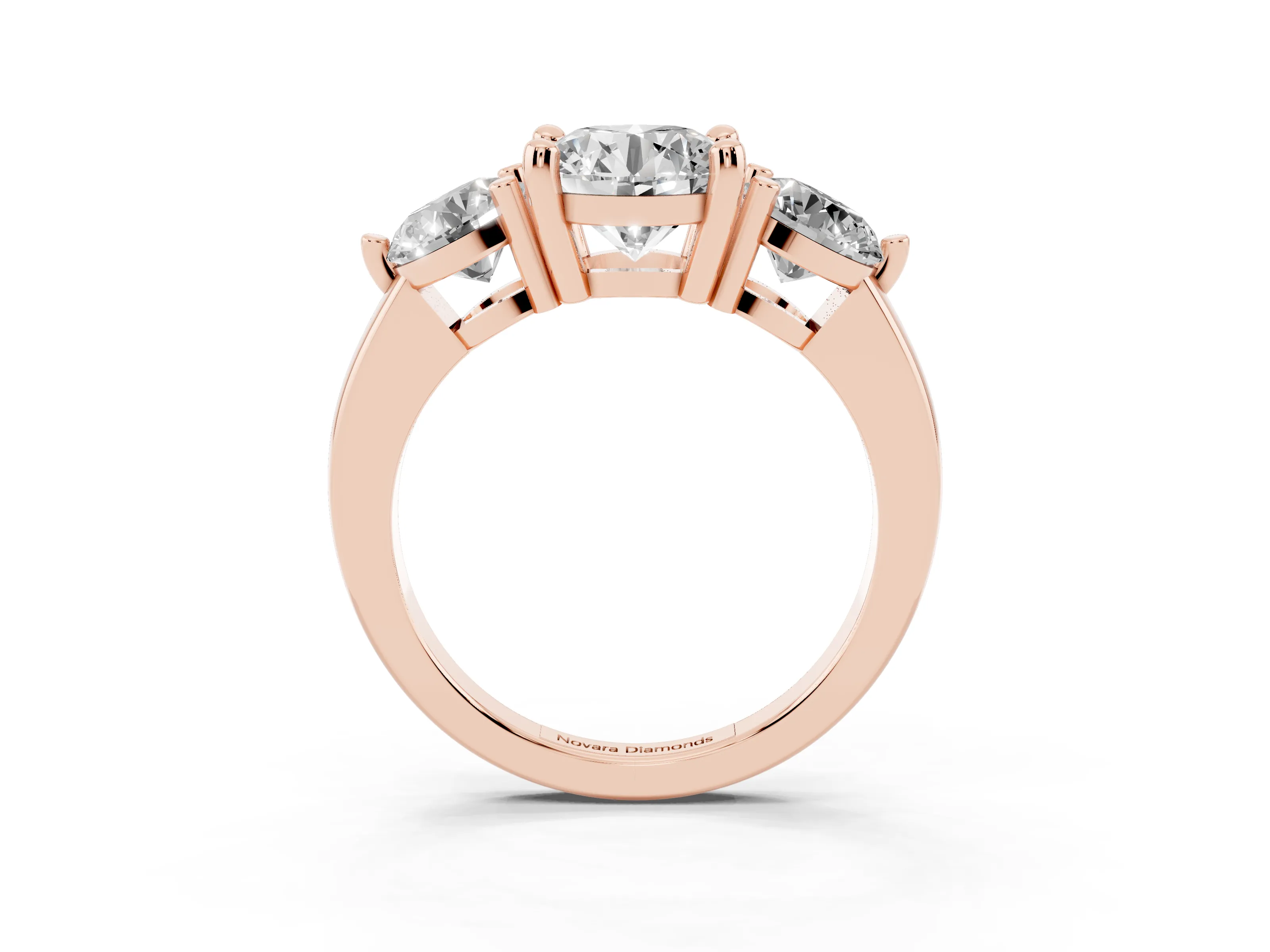 Round Cut Diamond Three-Stone Ring Set in Rose gold with Prong Setting and Classic Band