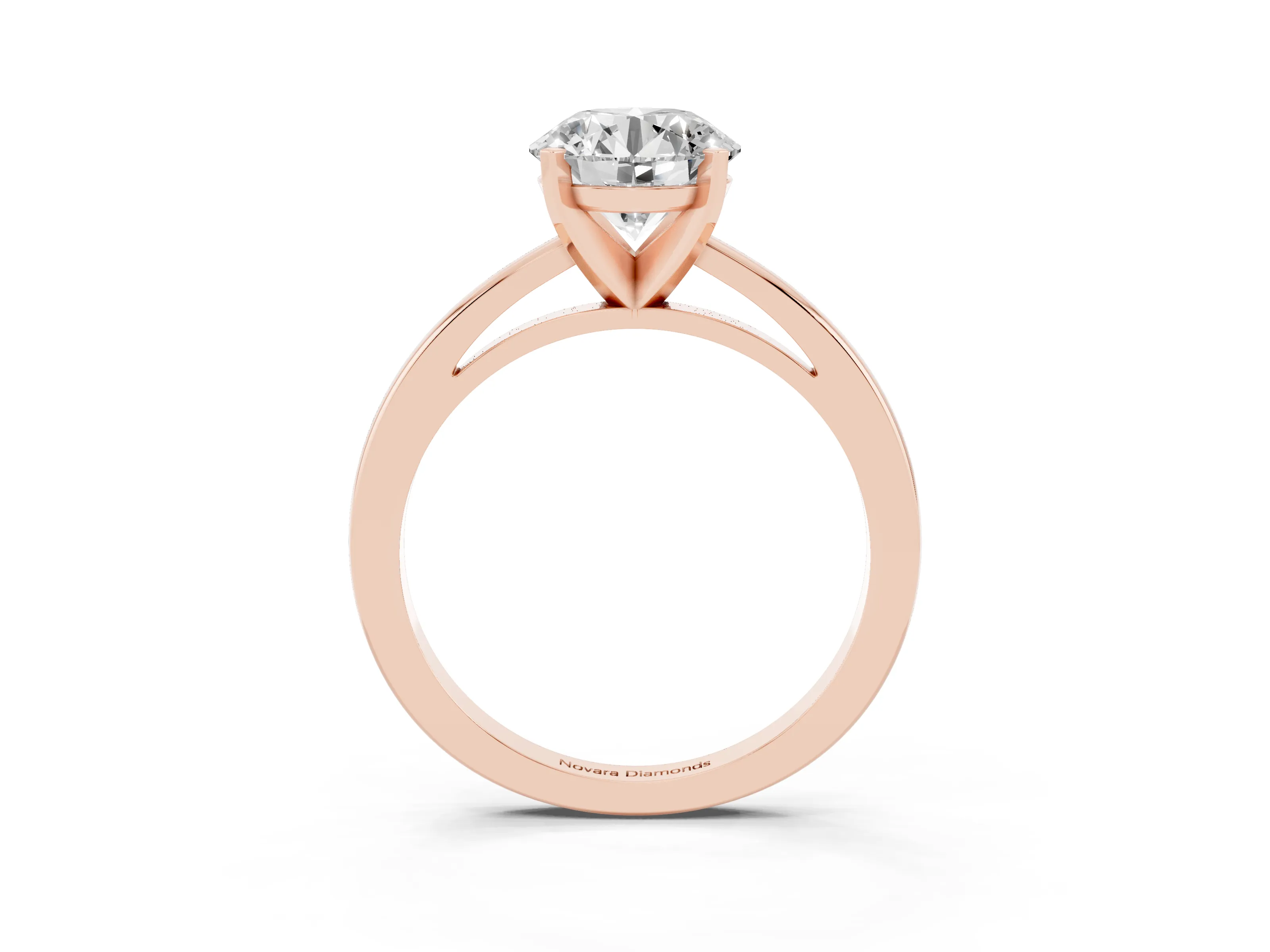 Round Cut Diamond Solitaire Engagement Ring Set in Rose gold with Prong Setting on a Classic Band