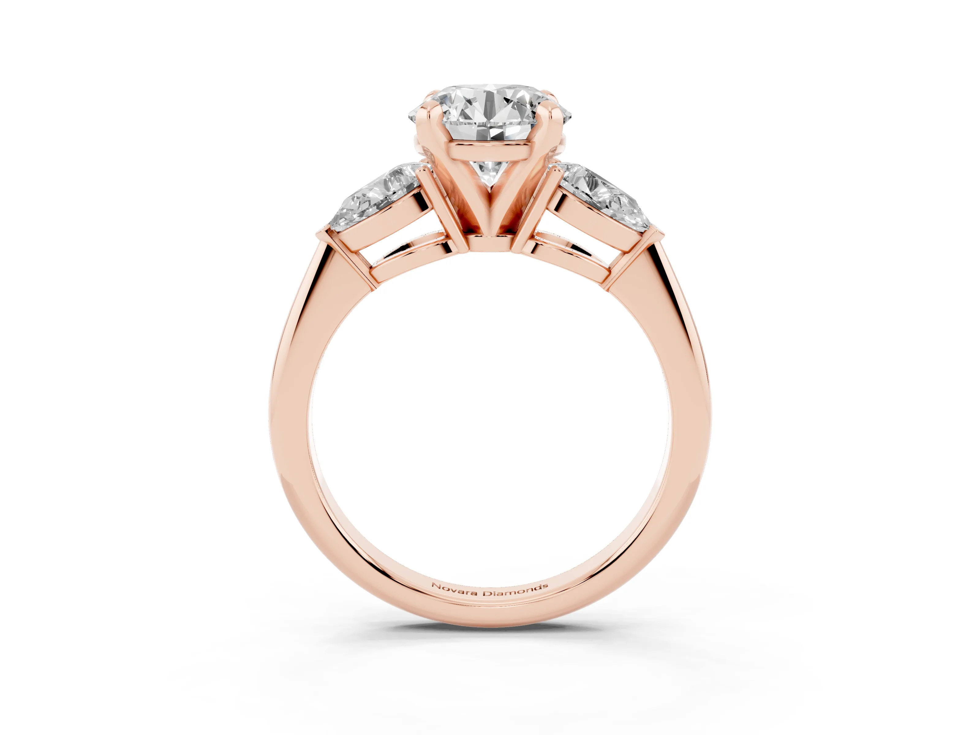 Three-Stone Round Cut Diamond Ring Set in Rose gold with Pear Side Stones and Prong Setting