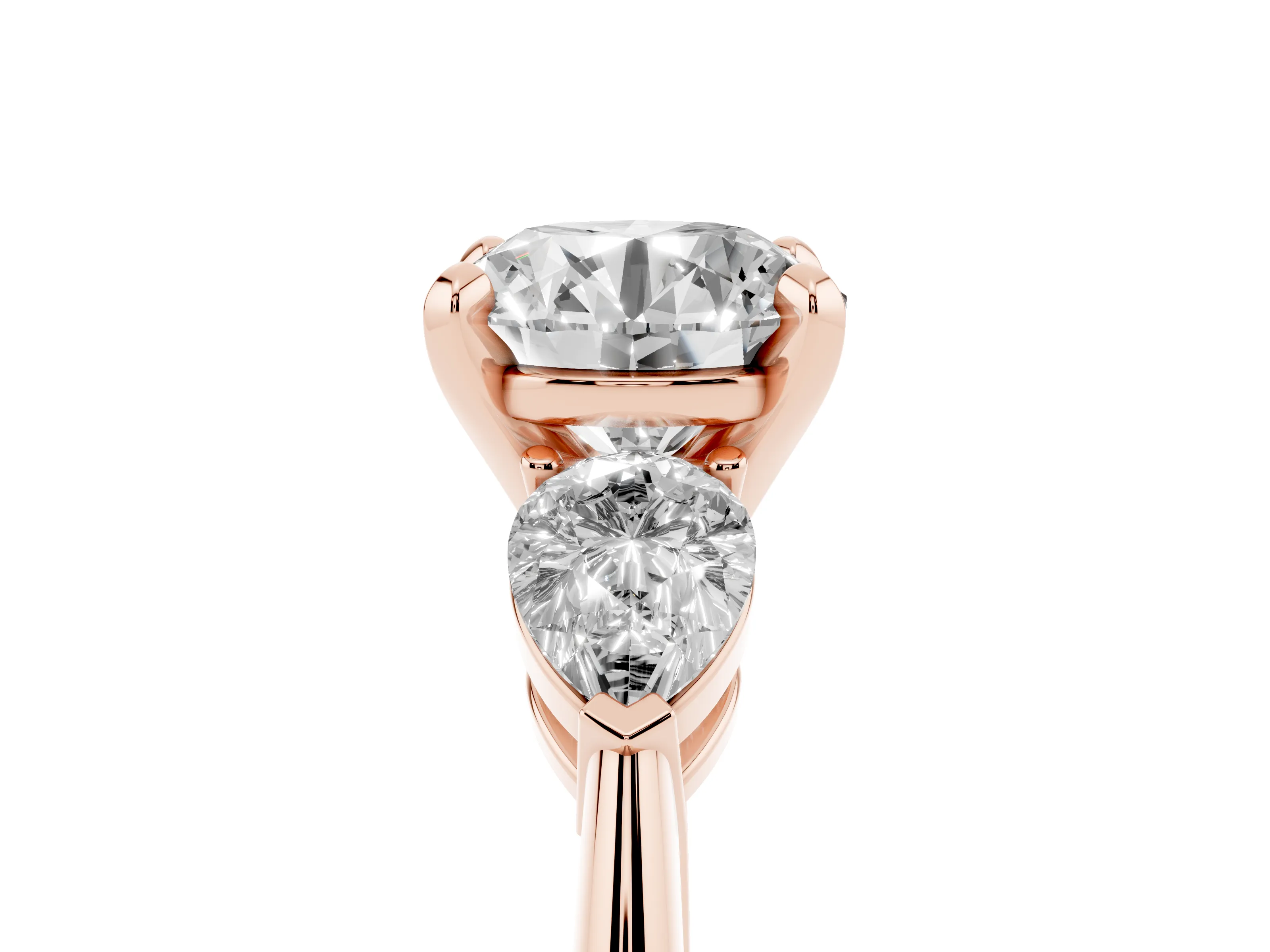Three-Stone Round Cut Diamond Ring Set in Rose gold with Pear Side Stones and Prong Setting