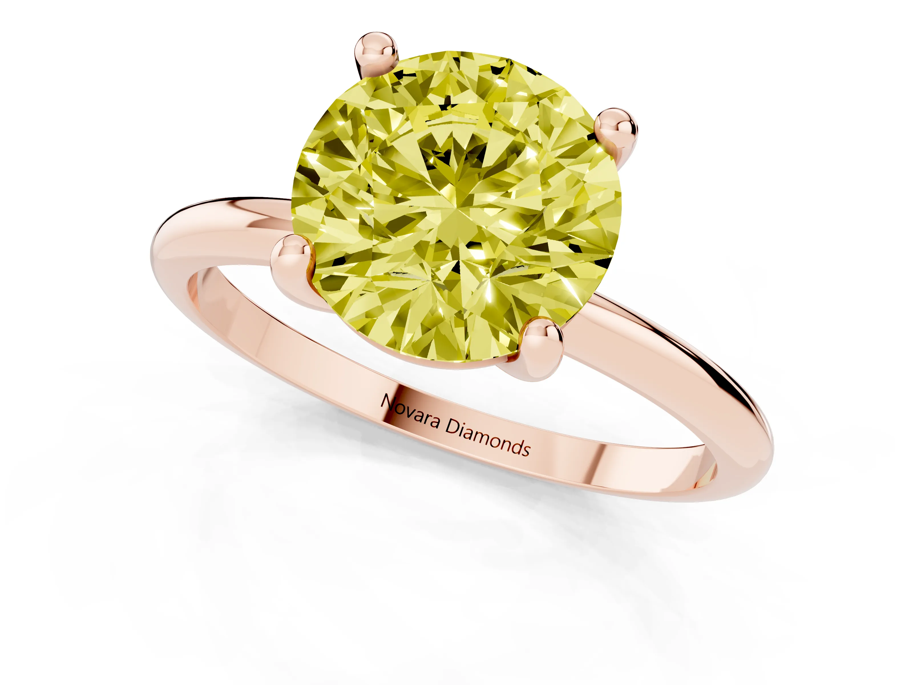 Fancy Yellow Round Cut Diamond Solitaire Ring Set in Rose gold with Secure Prong Setting on a Classic Band