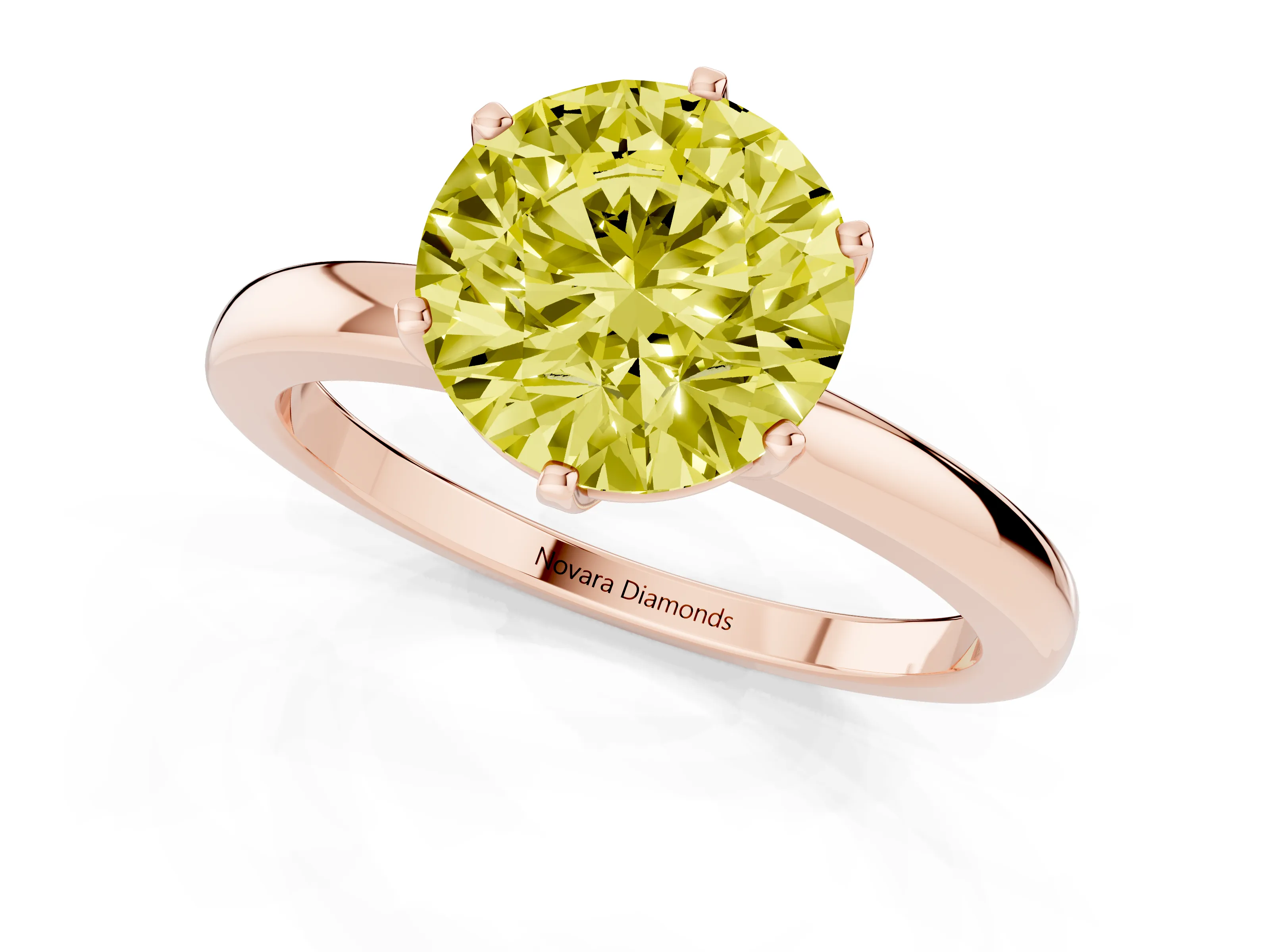 Fancy Yellow Round Cut Diamond Solitaire Ring Set in Rose gold with Raised Prong Setting on a Classic Band