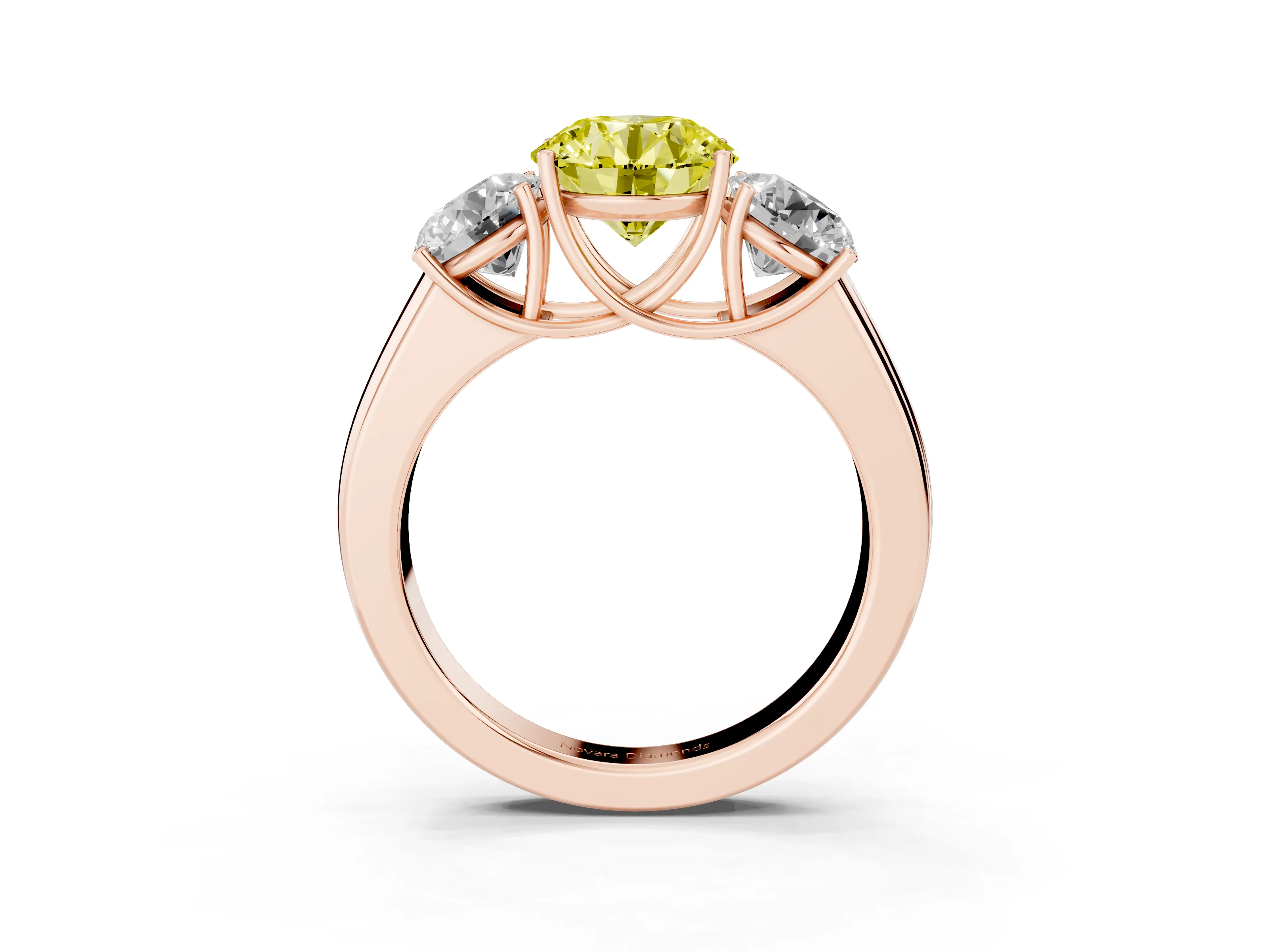 Fancy Yellow Three-Stone Round Cut Diamond Ring Set in Rose gold with Matching Prong Settings and Plain Band