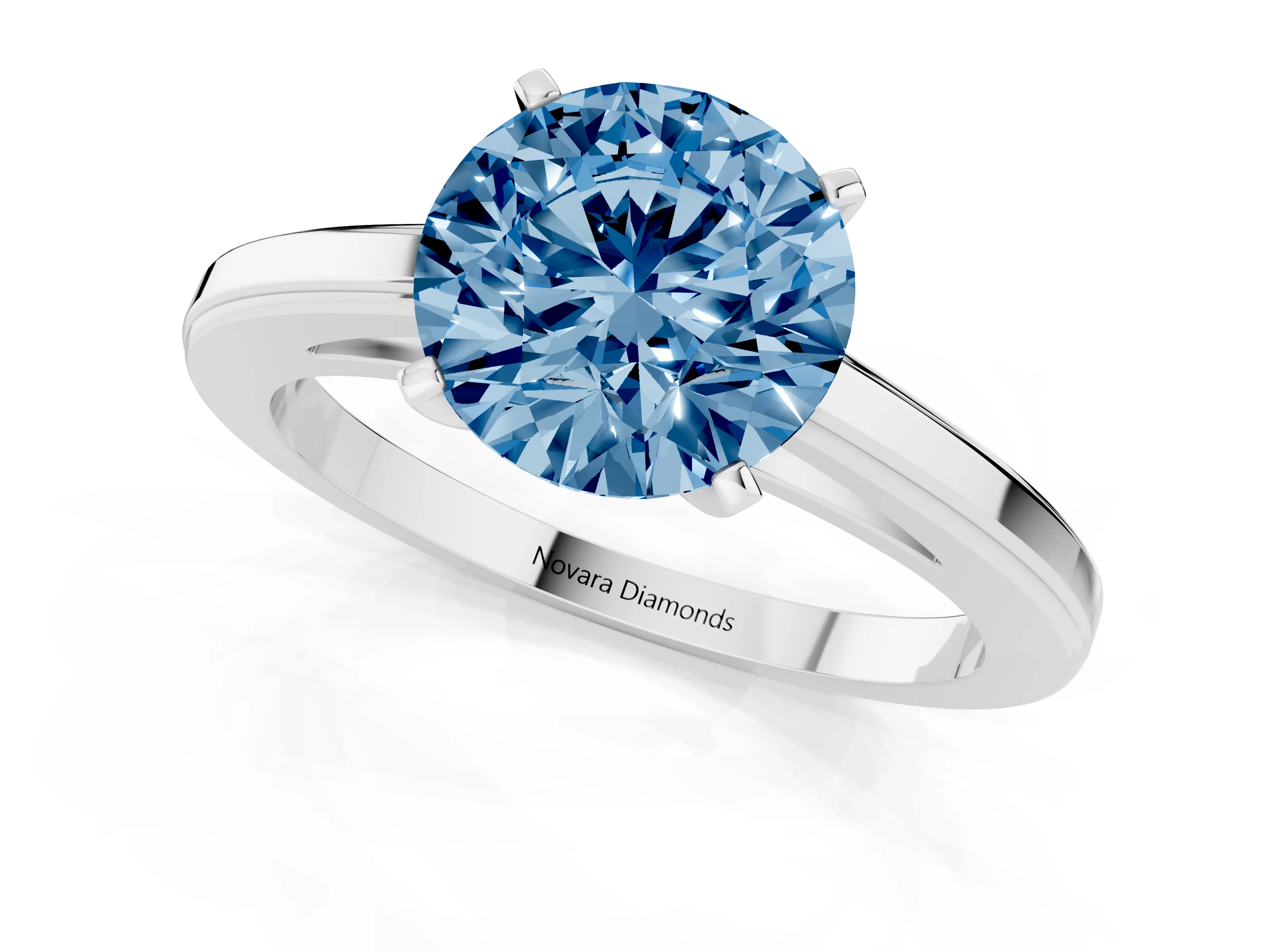 Fancy Blue Round Cut Diamond Solitaire Ring Set in Silver with Prong Setting and Classic Band