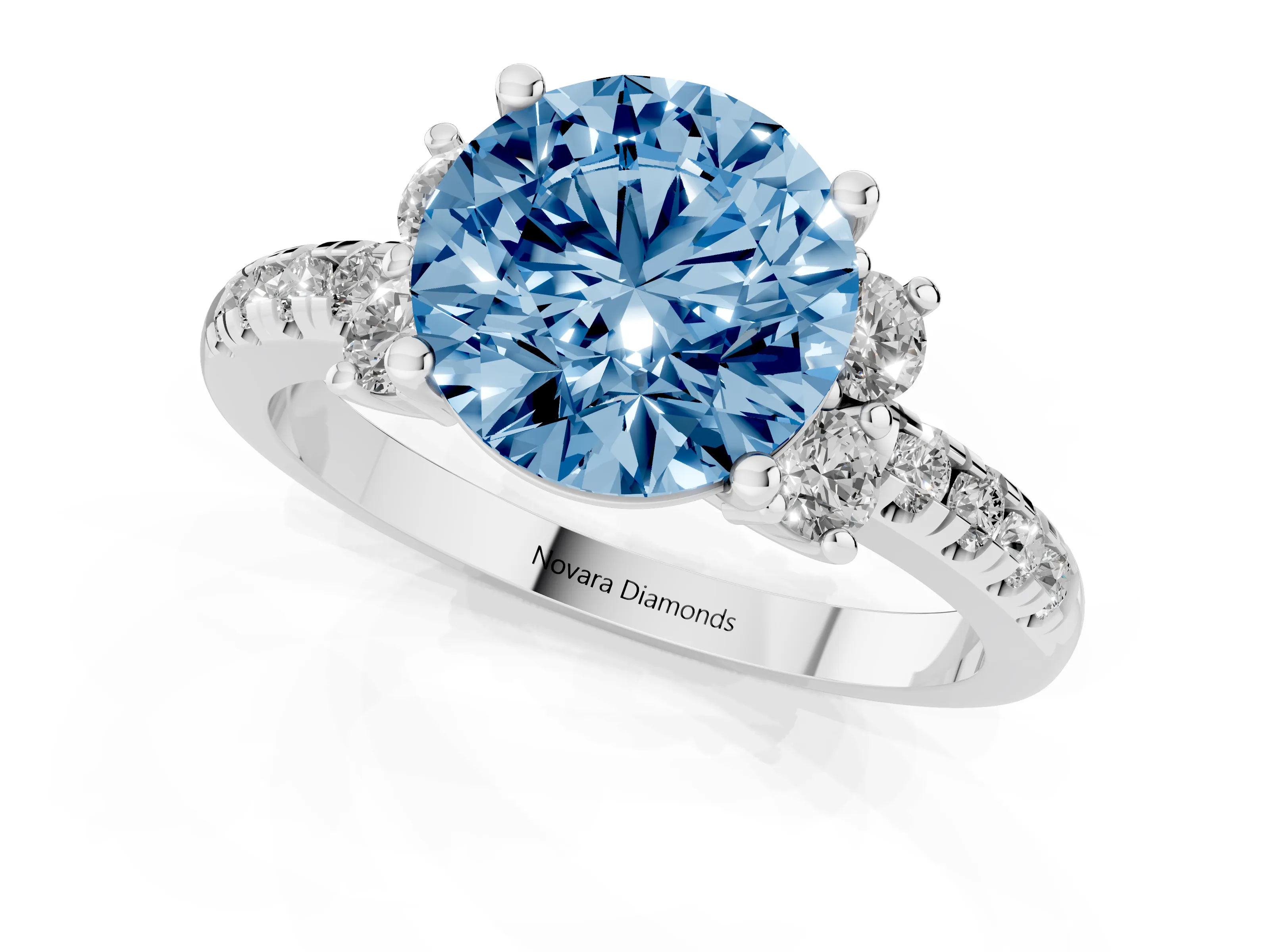 Fancy Blue Round Cut Diamond Three-Stone Pavé Ring Set in White gold with Prong Setting