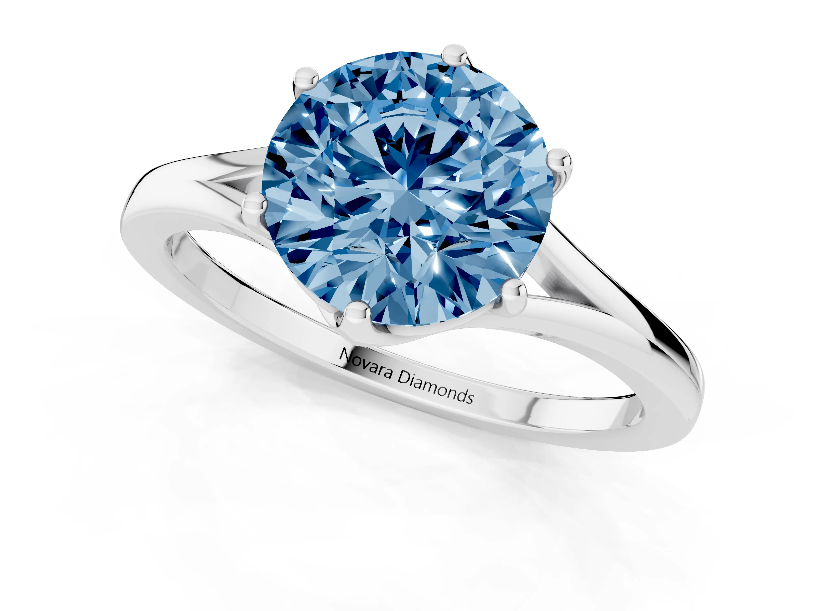 Fancy Blue Round Cut Diamond Solitaire Ring Set in Silver with Polished Tapered Band and Prong Setting