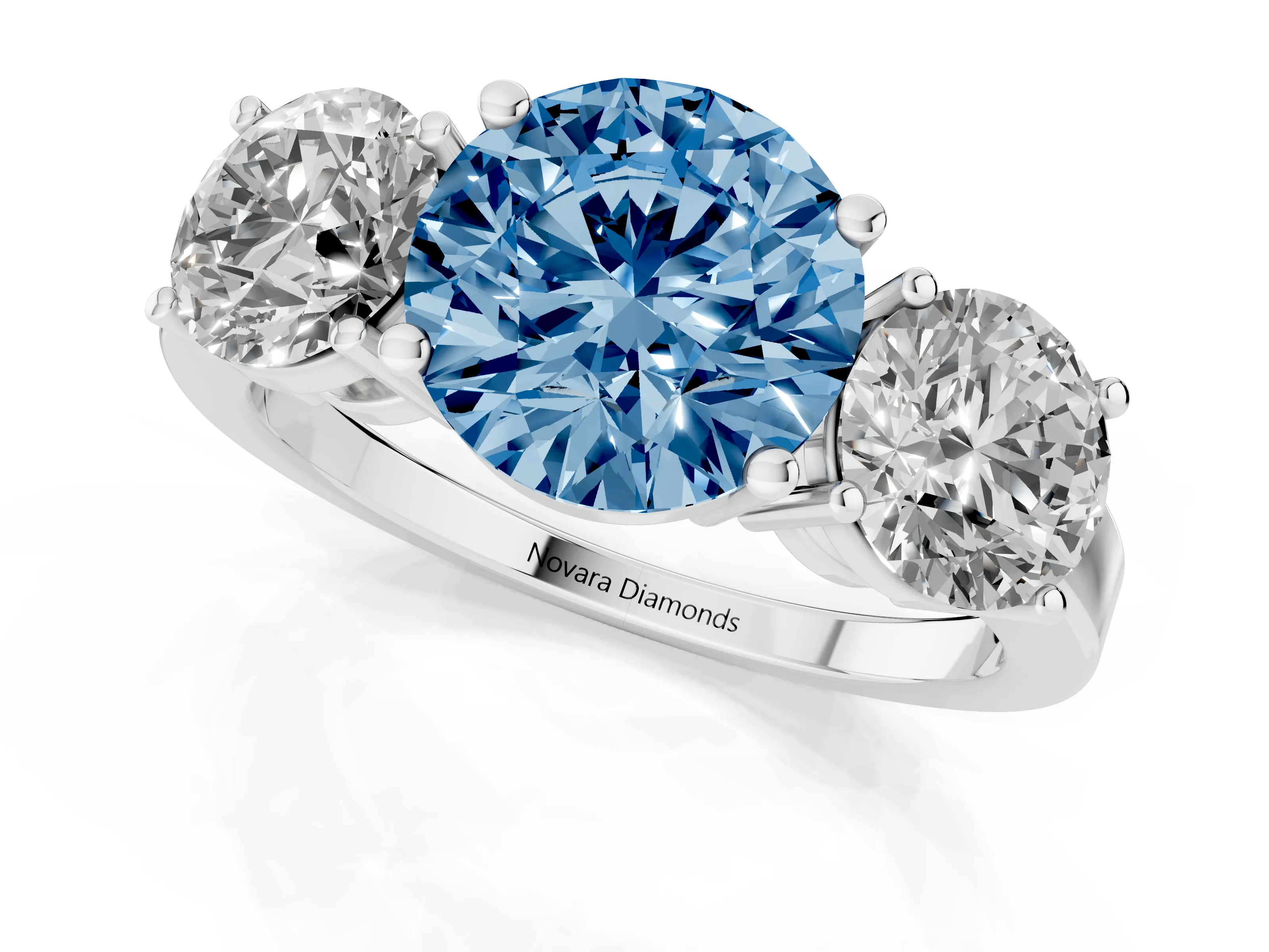 Fancy Blue Round Cut Diamond Three-Stone Engagement Ring Set in Silver with Flat Band