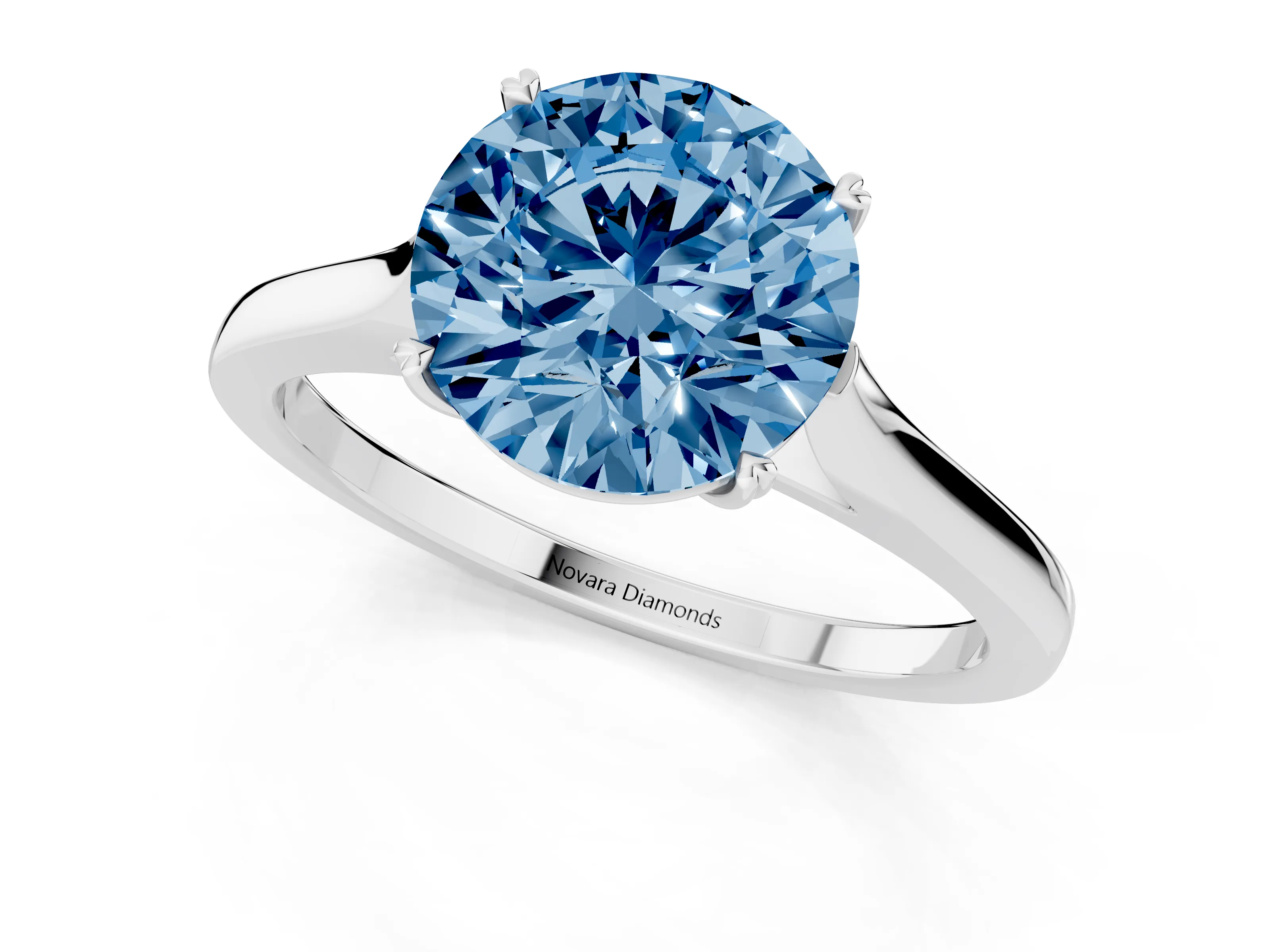 Fancy Blue Round Cut Diamond Solitaire Heart Prong Engagement Ring Set in Platinum with Tapered Band