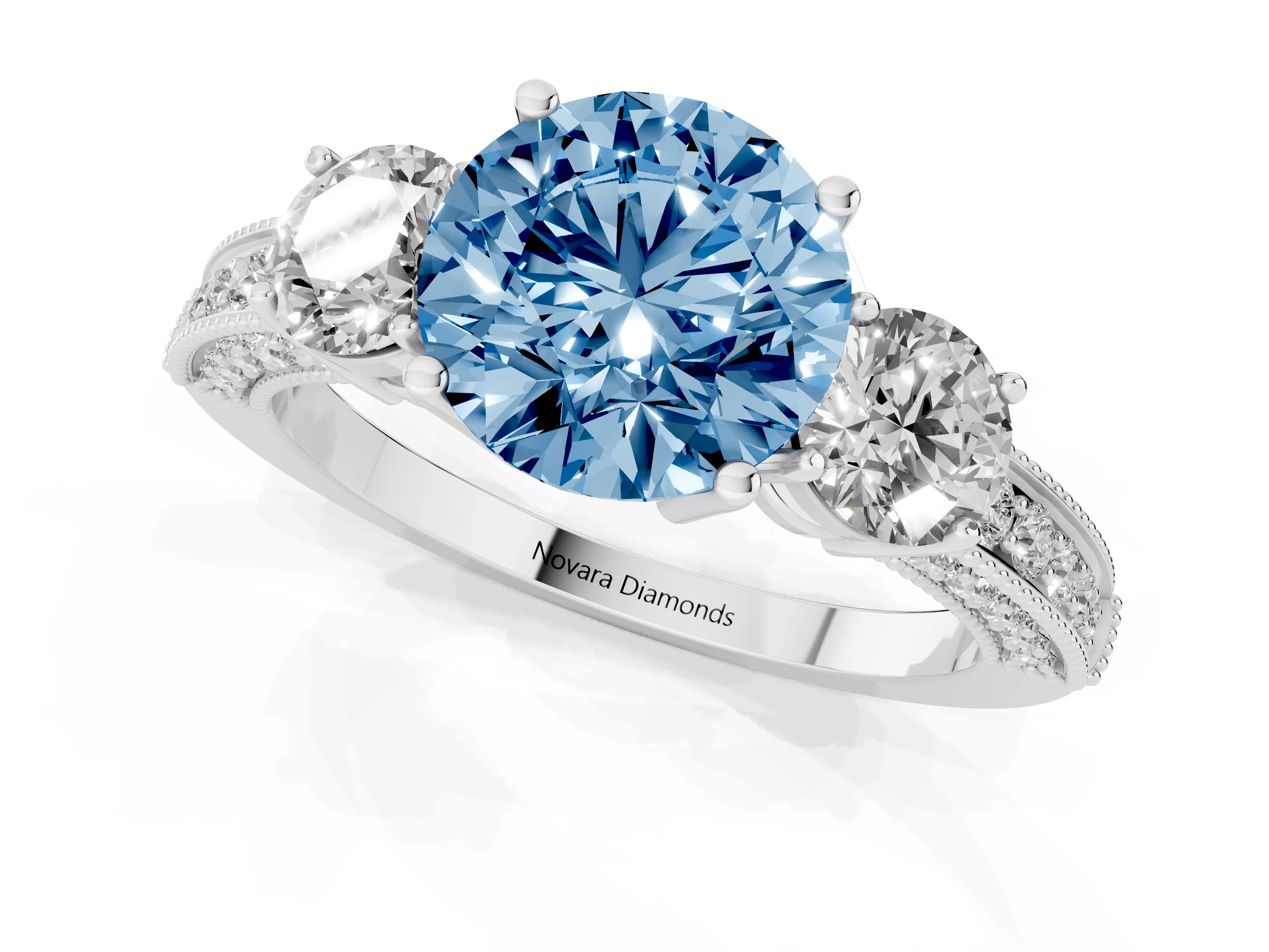 Fancy Blue Round Cut Diamond Three-Stone Ring Set in White gold with Round Side Stones and Pavé Band