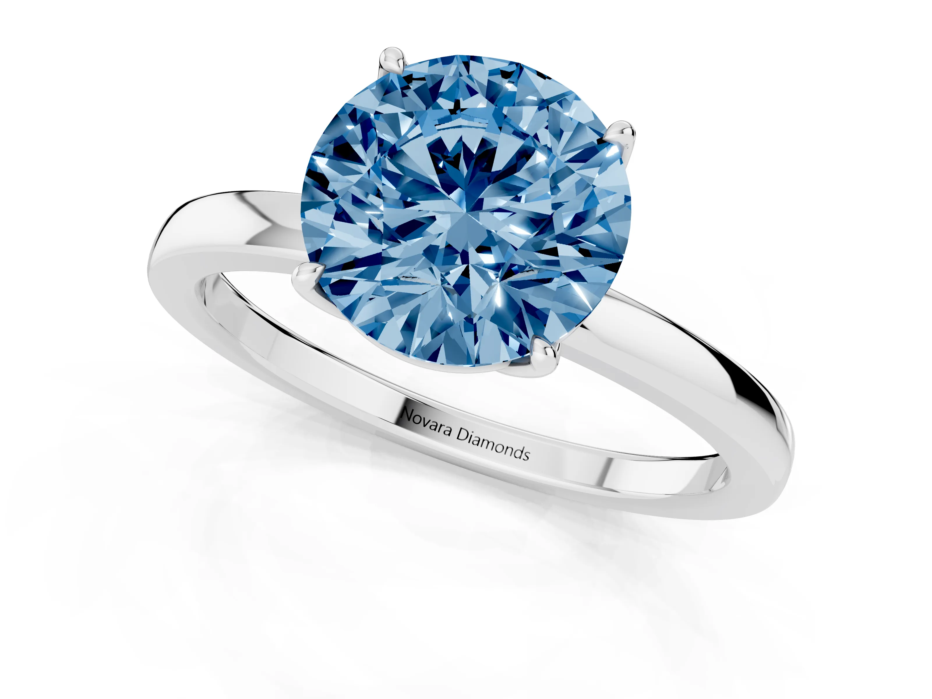 Fancy Blue Round Cut Diamond Solitaire Ring Set in White gold with Prong Setting and Thin Polished Band