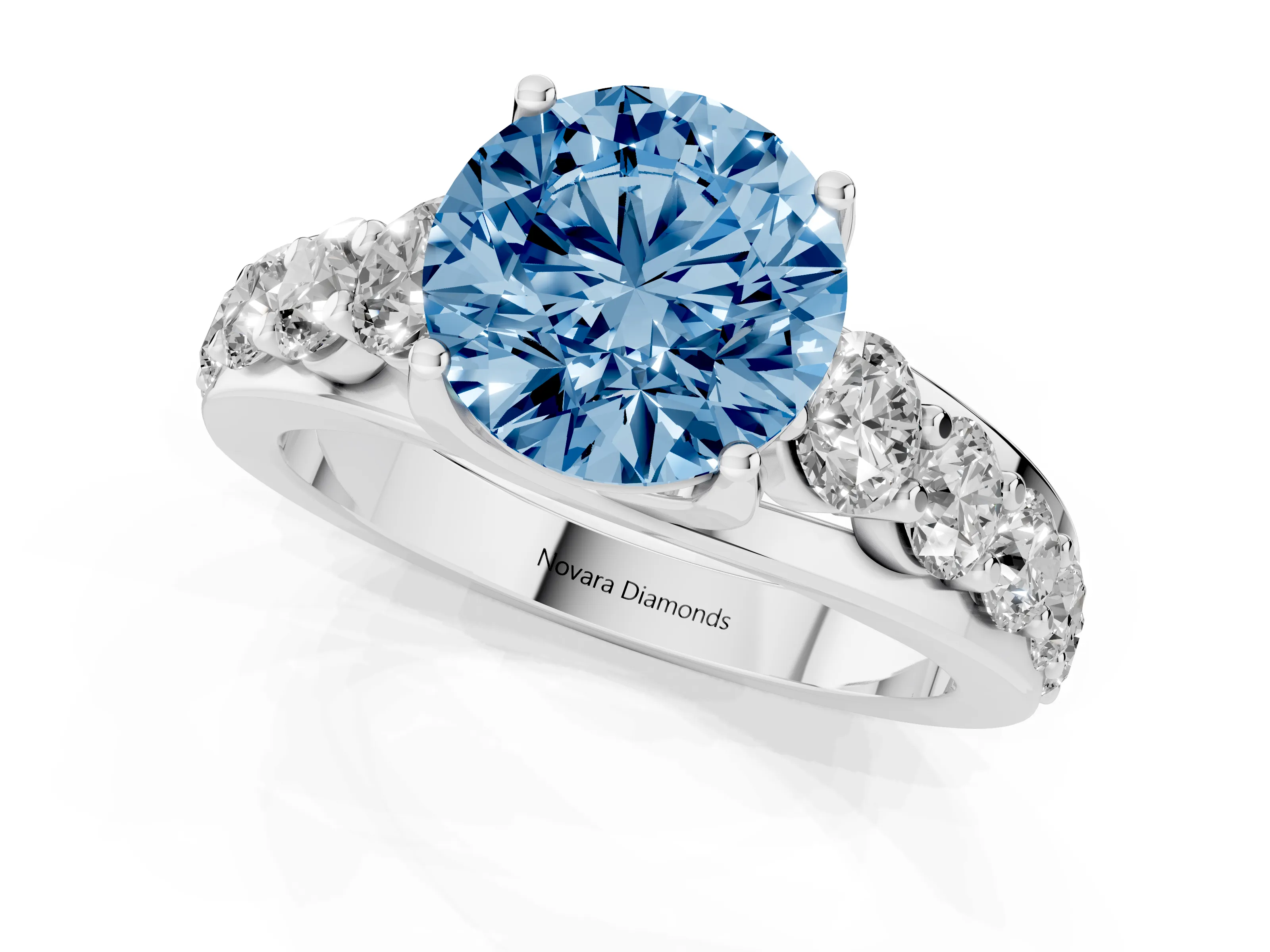 Fancy Blue Round Cut Diamond Pavé Engagement Ring Set in White gold with Prong Setting