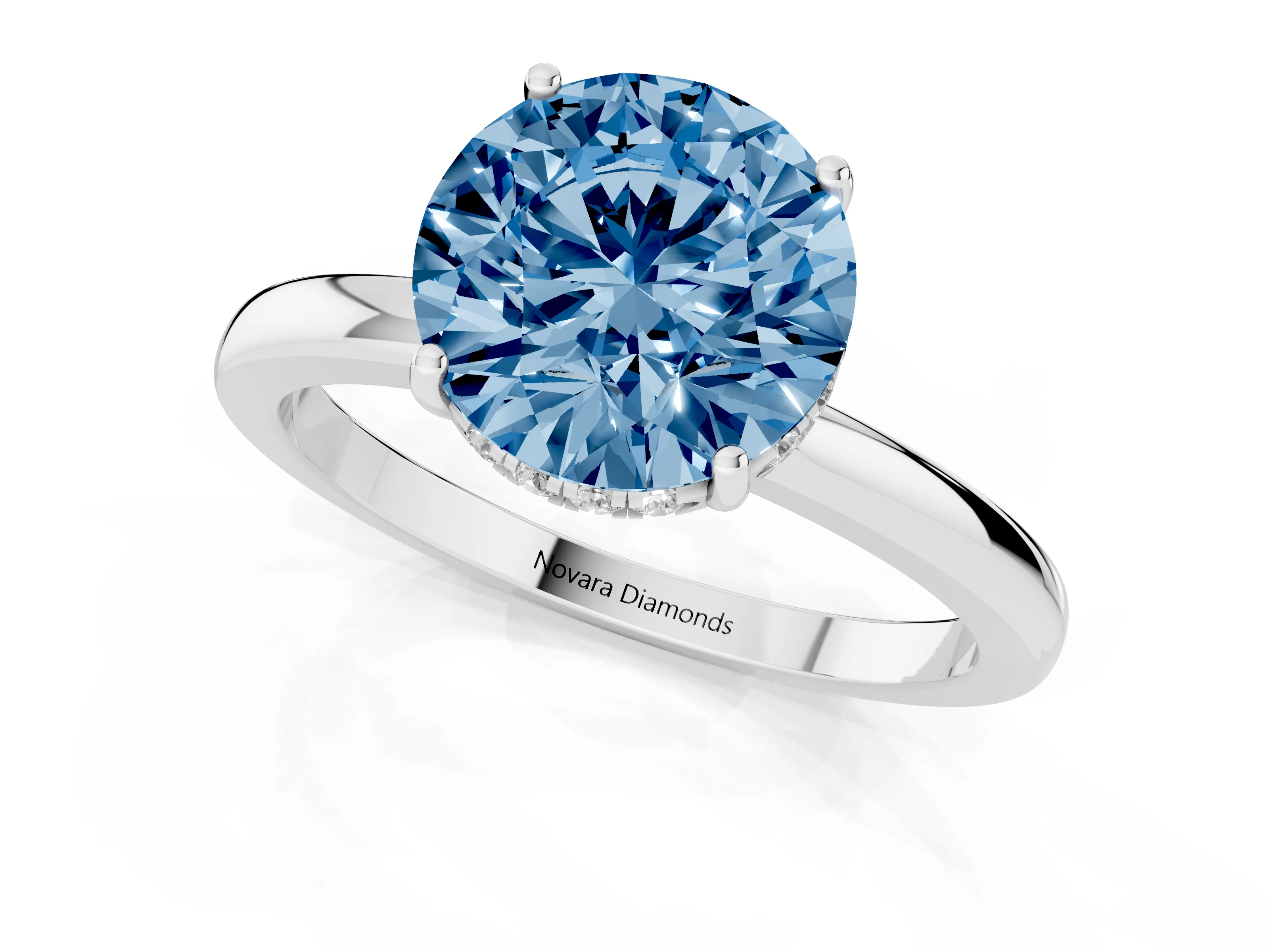 Fancy Blue Round Cut Diamond Solitaire Ring Set in White gold with Plain Band and Prong Setting