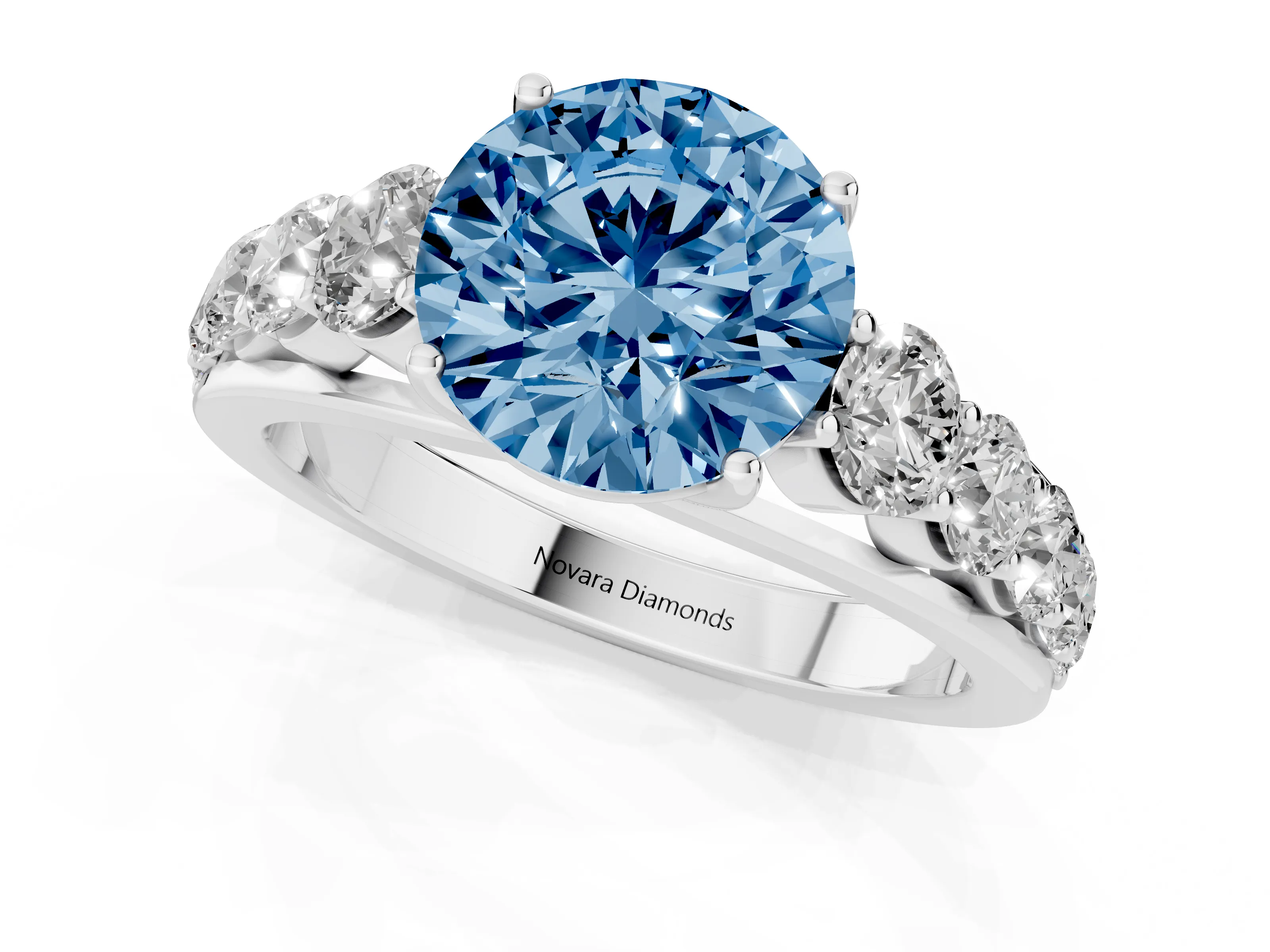 Fancy Blue Round Cut Diamond Solitaire Ring Set in Silver with Pavé-Set Band and Prong Setting