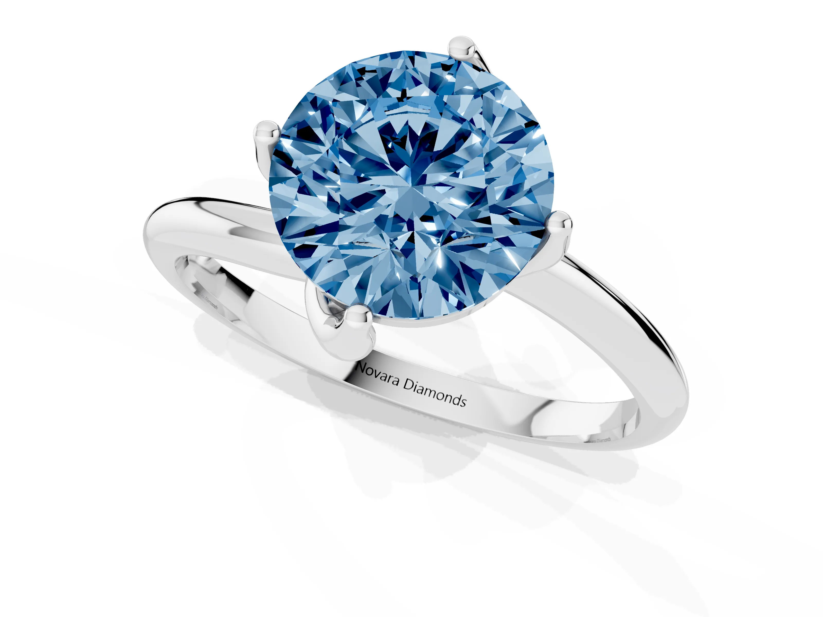 Fancy Blue Round Cut Diamond Solitaire Engagement Ring Set in Silver with Classic Plain Band