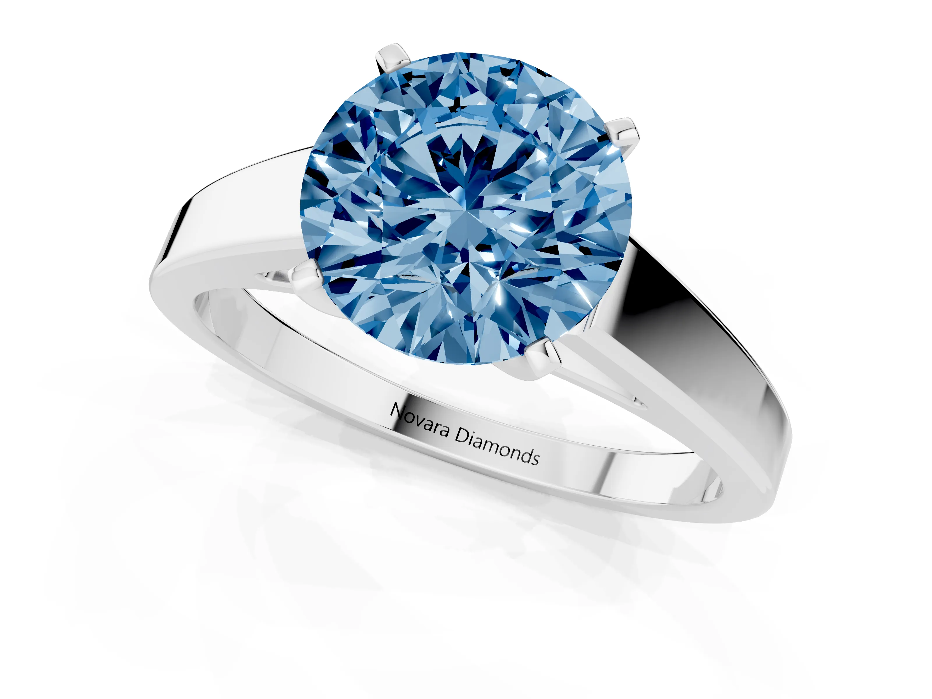 Fancy Blue Round Cut Diamond Solitaire Engagement Ring Set in White gold with Prong Setting and Tapered Band
