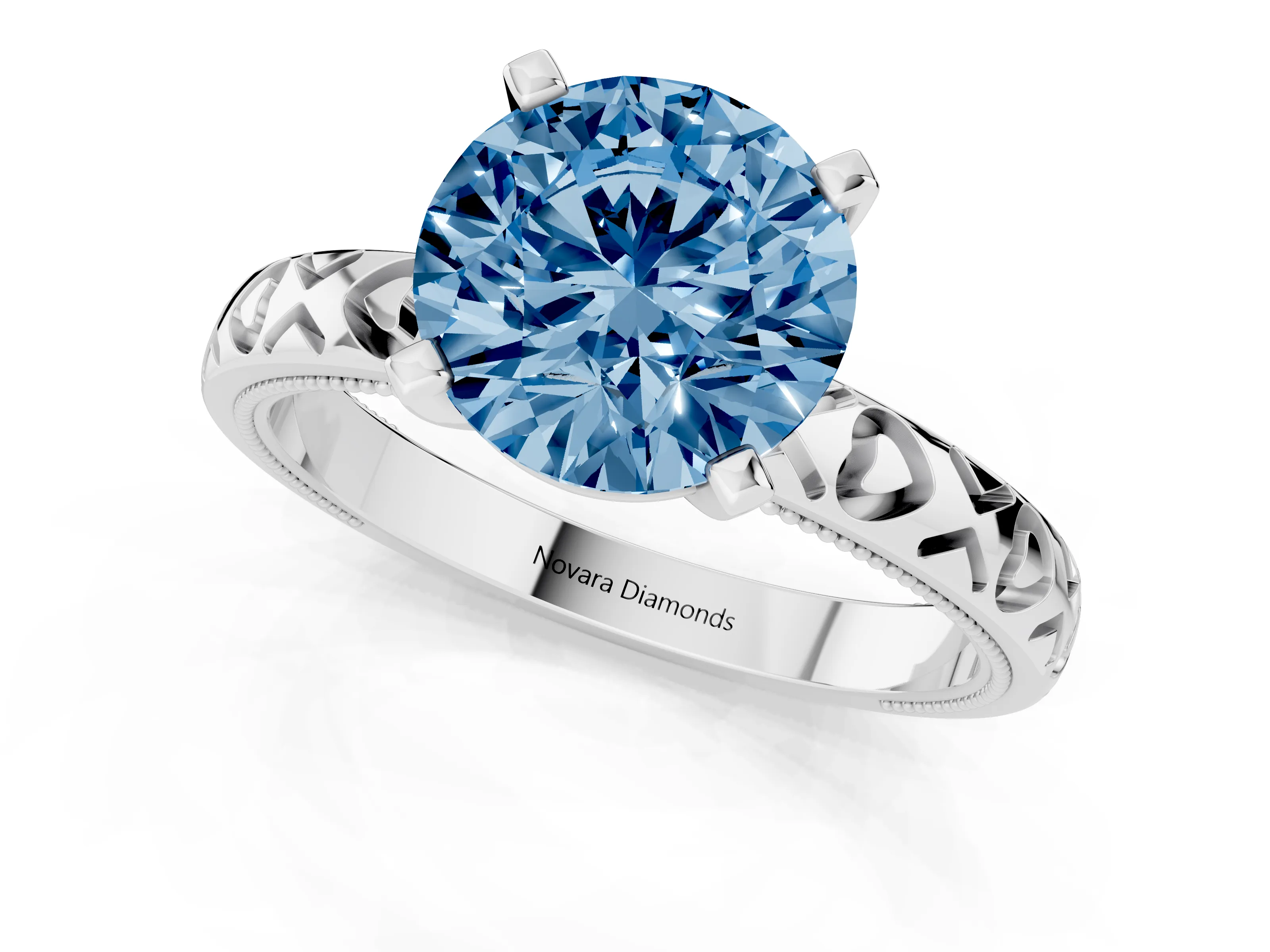 Fancy Blue Round Cut Diamond Solitaire Engagement Ring Set in Platinum with XO Engraved Band and Prong Setting
