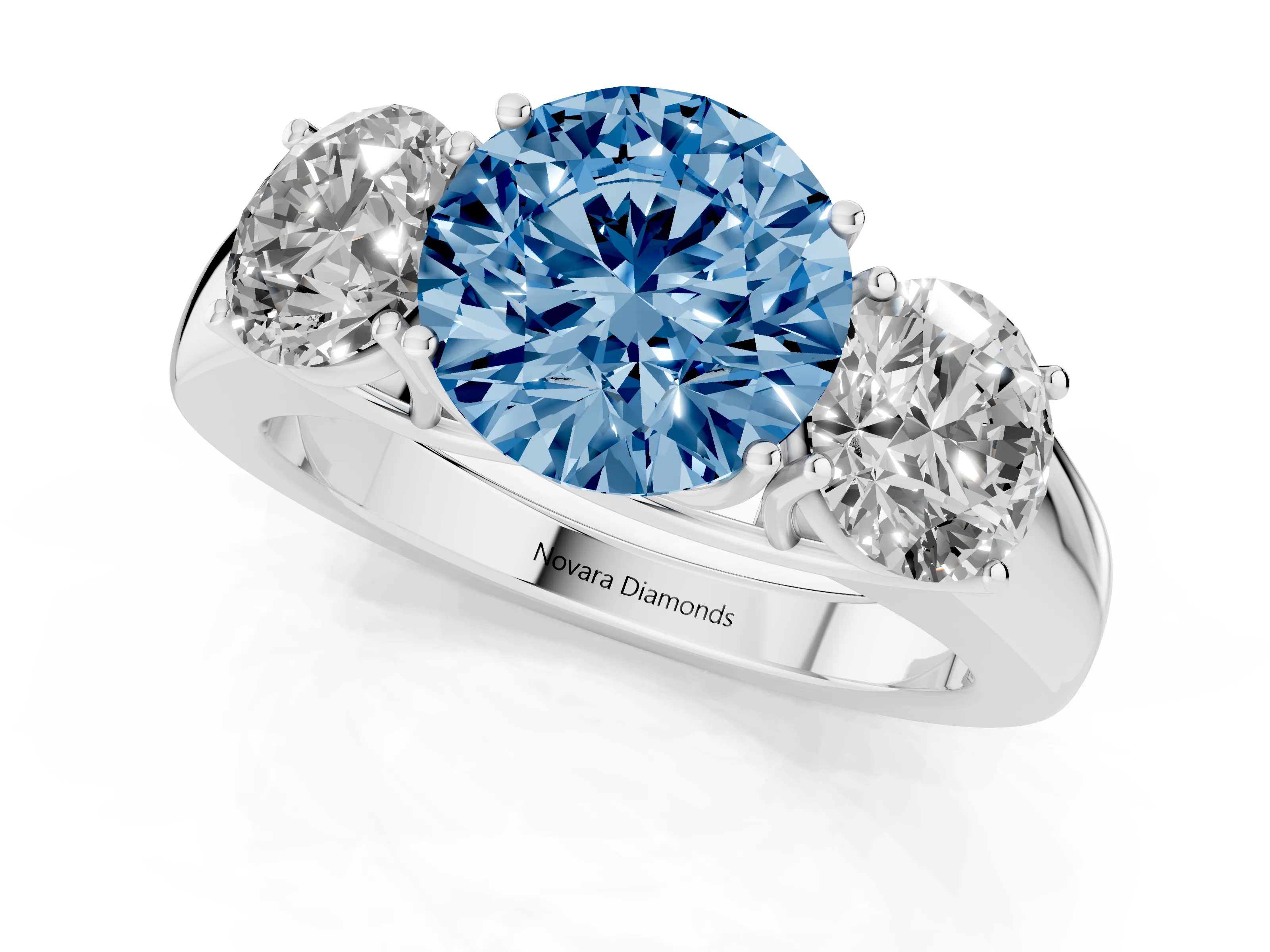 Fancy Blue Three-Stone Round Cut Diamond Ring Set in Silver with Matching Prong Settings and Plain Band