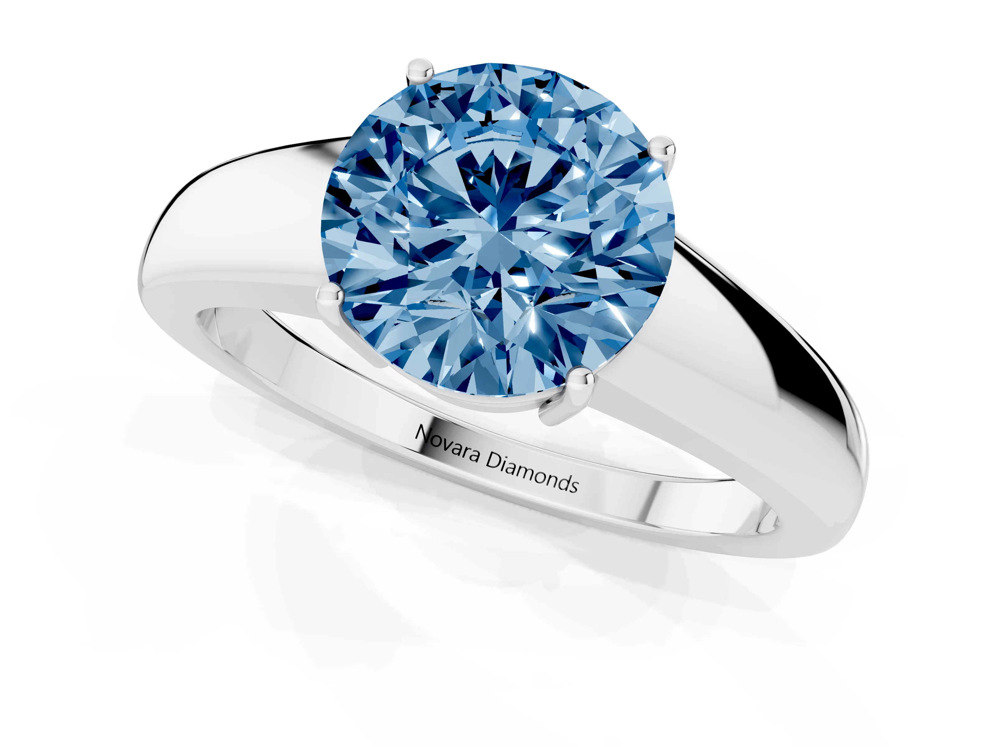 Fancy Blue Round Cut Diamond Solitaire Ring Set in Silver with Tapered Band and Prong Setting