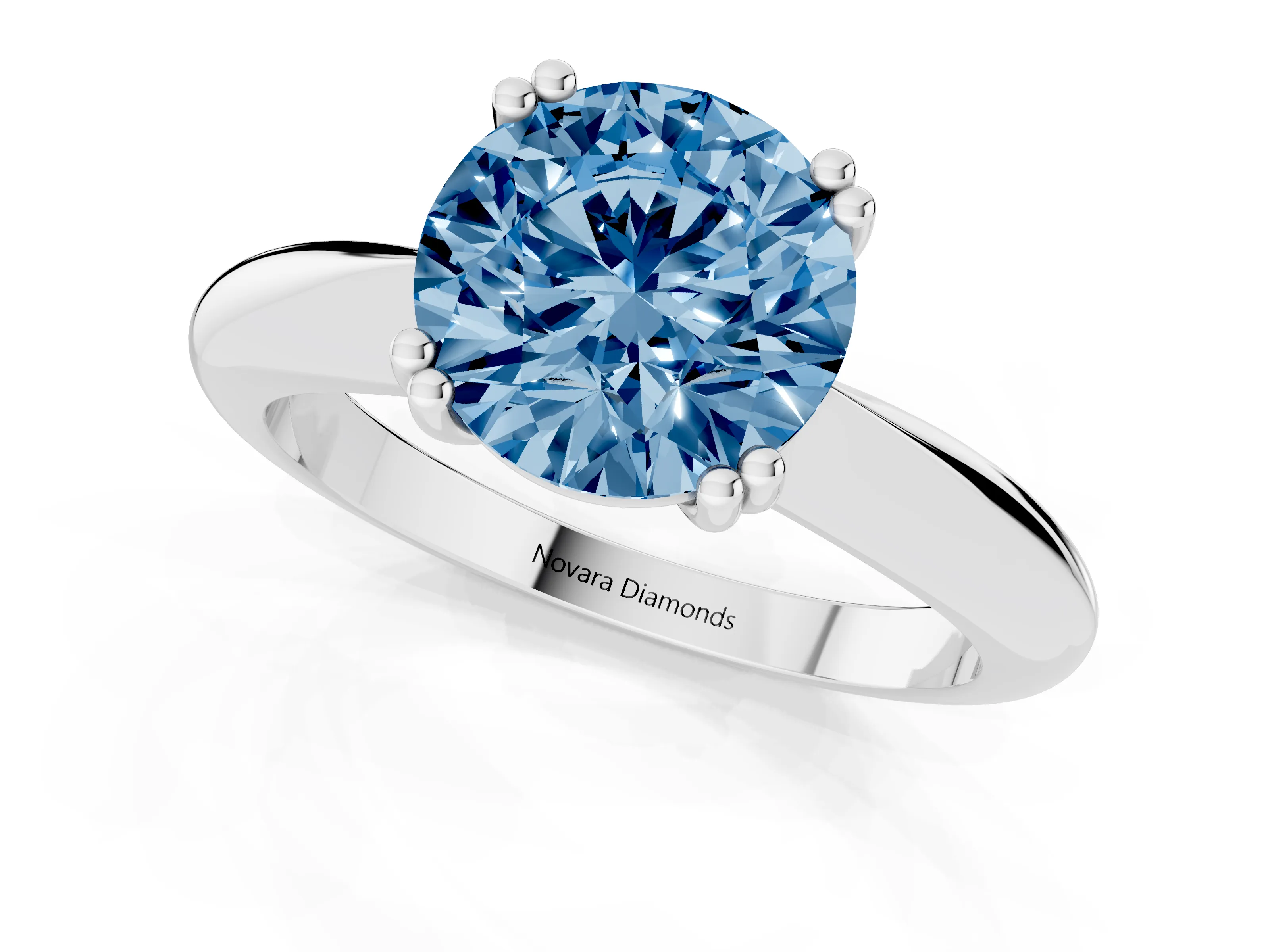 Fancy Blue Round Cut Diamond Solitaire Engagement Ring Set in White gold with Tapered Band and Prong Setting