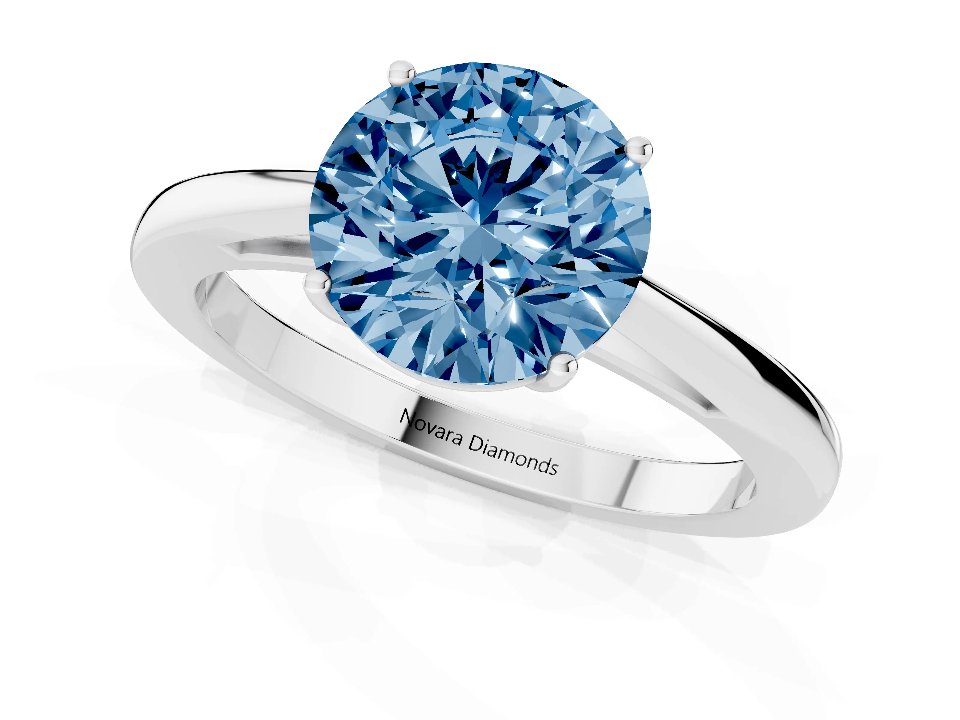 Fancy Blue Round Cut Diamond Solitaire Ring Set in Silver with Split Shank and Prong Setting