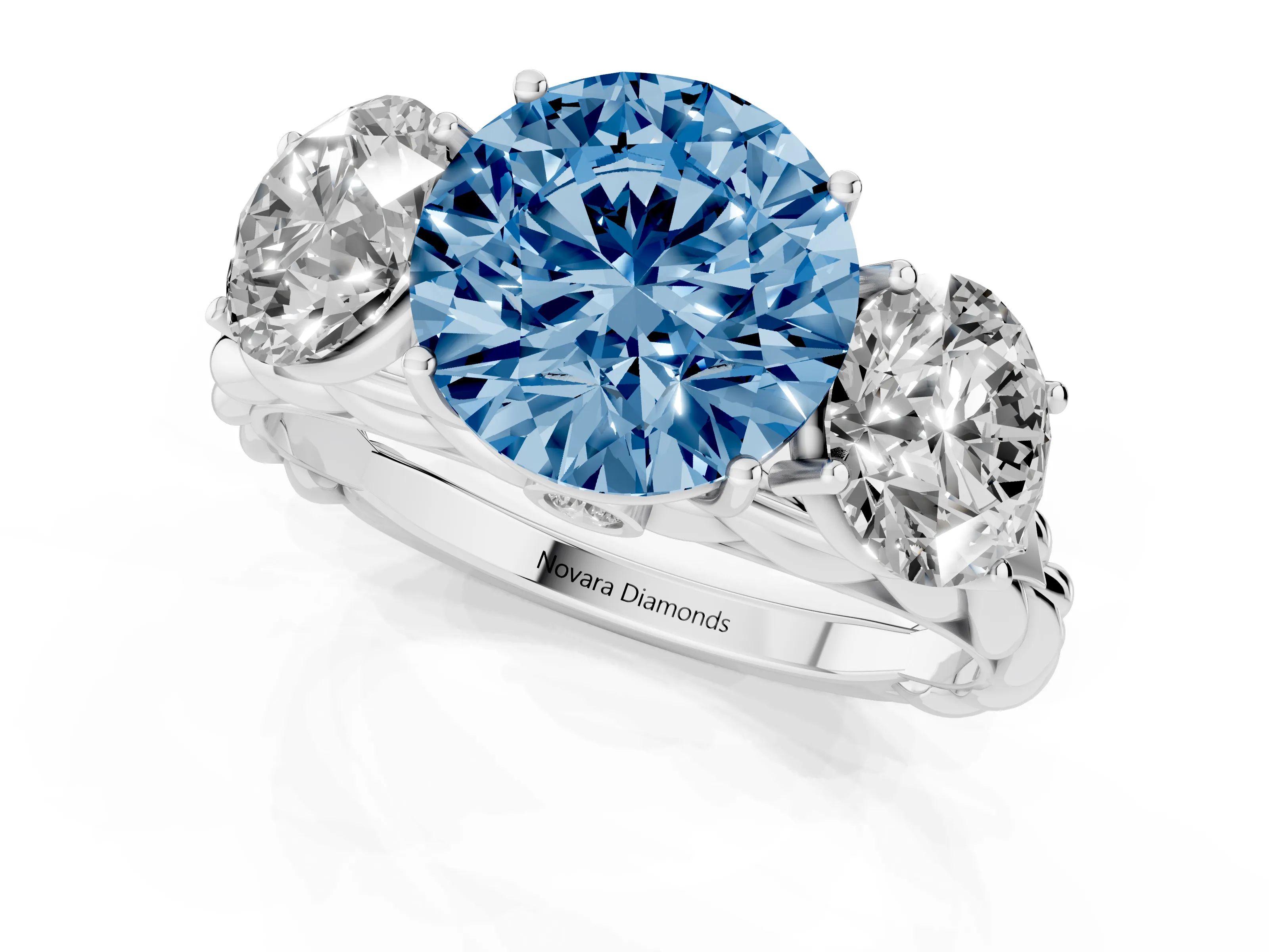Fancy Blue Round Cut Diamond Three-Stone Ring Set in Platinum with Braided Band