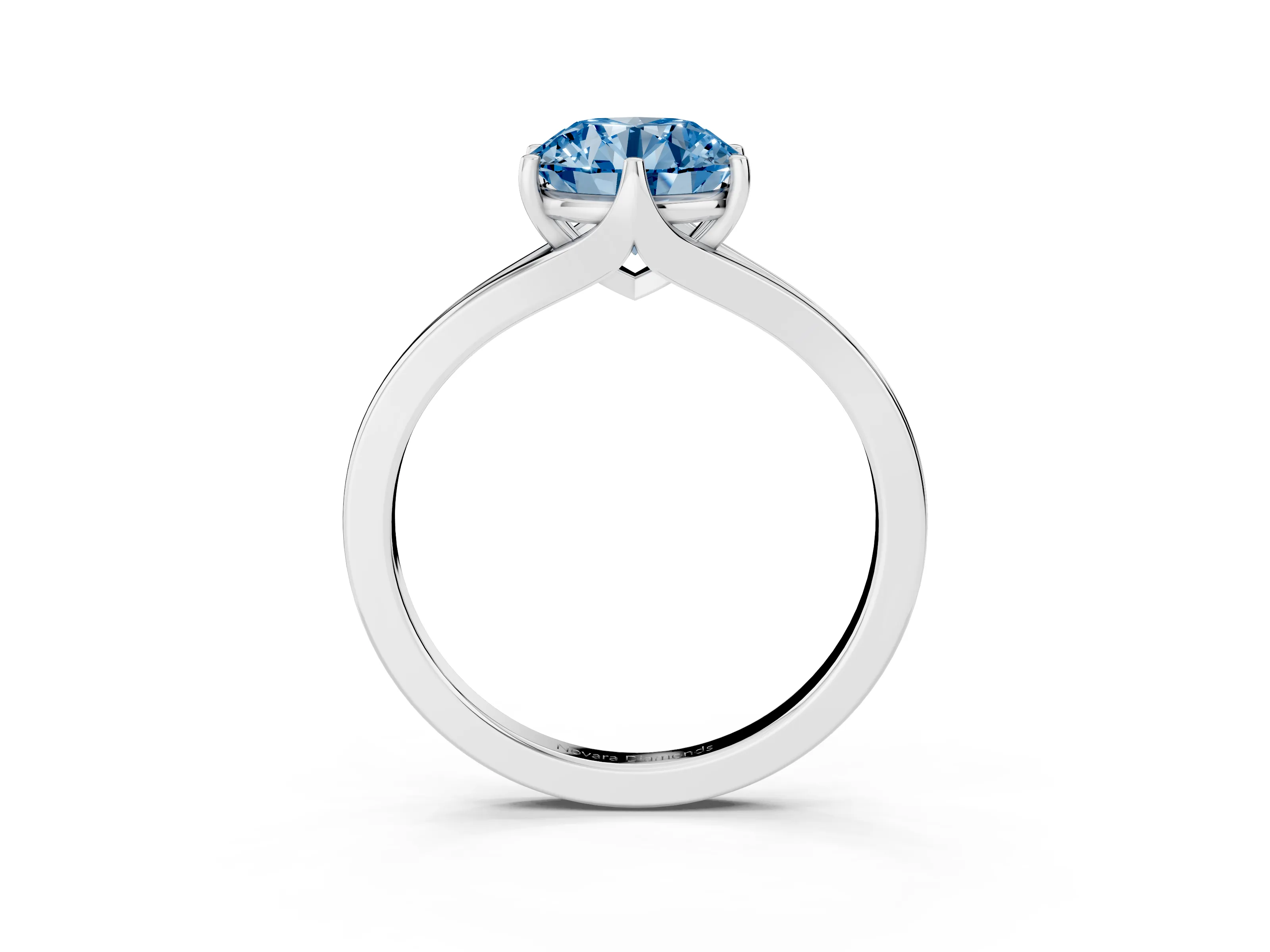 Fancy Blue Round Cut Diamond Solitaire Ring Set in Silver with Polished Tapered Band and Prong Setting
