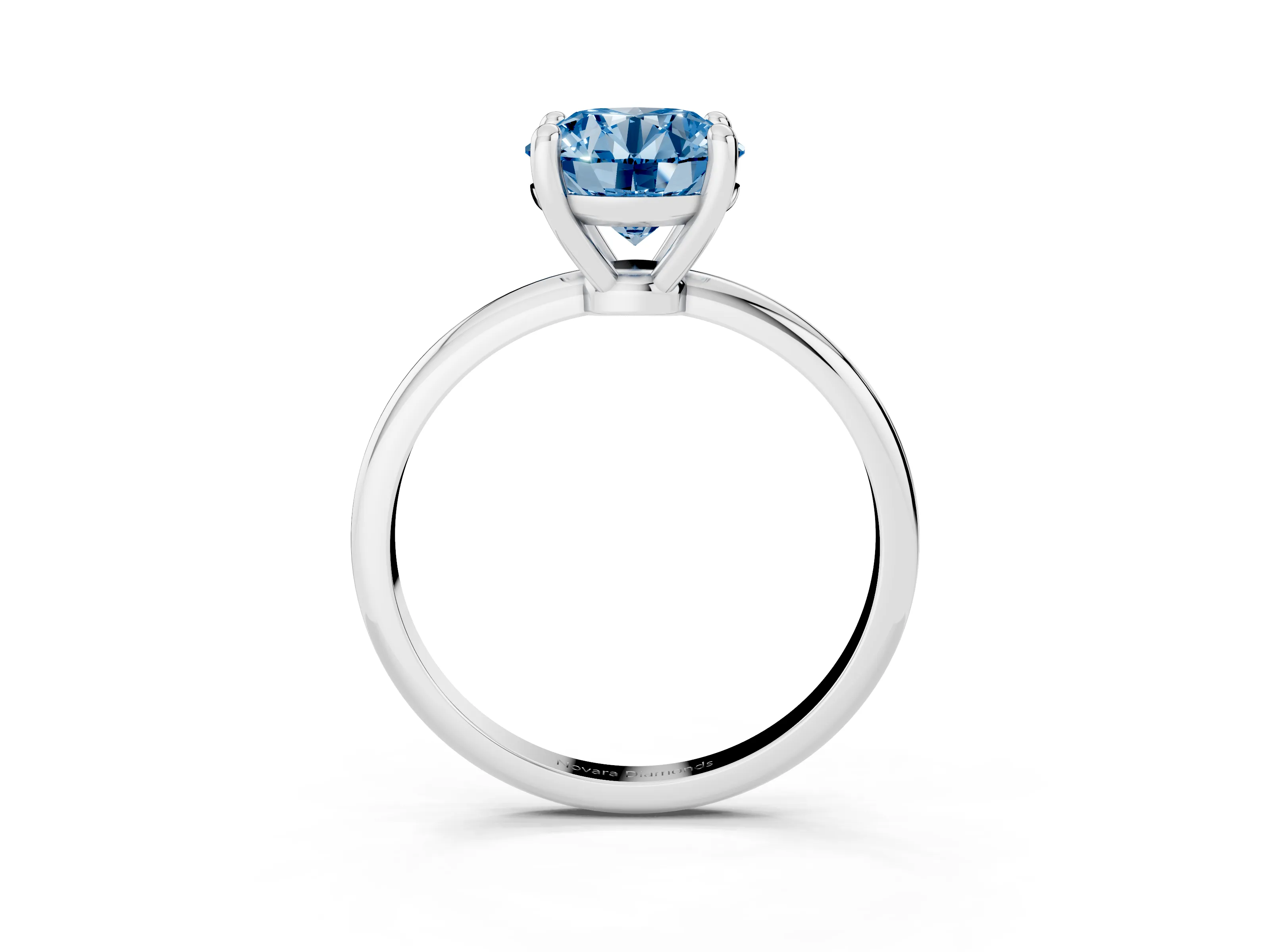 Fancy Blue Round Cut Diamond Solitaire Ring Set in White gold with Secure Prong Setting on a Classic Band