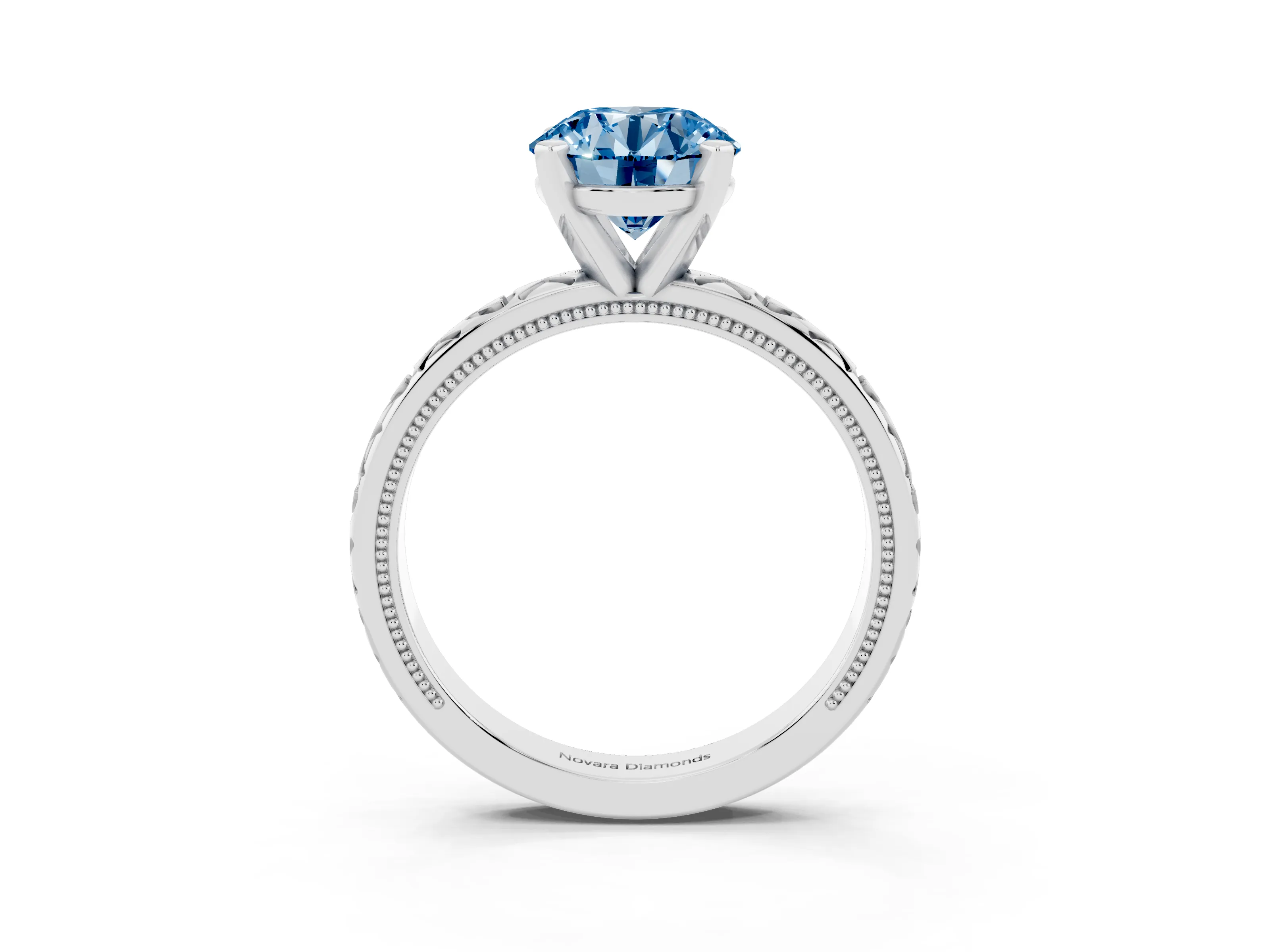 Fancy Blue Round Cut Diamond Solitaire Engagement Ring Set in Platinum with XO Engraved Band and Prong Setting