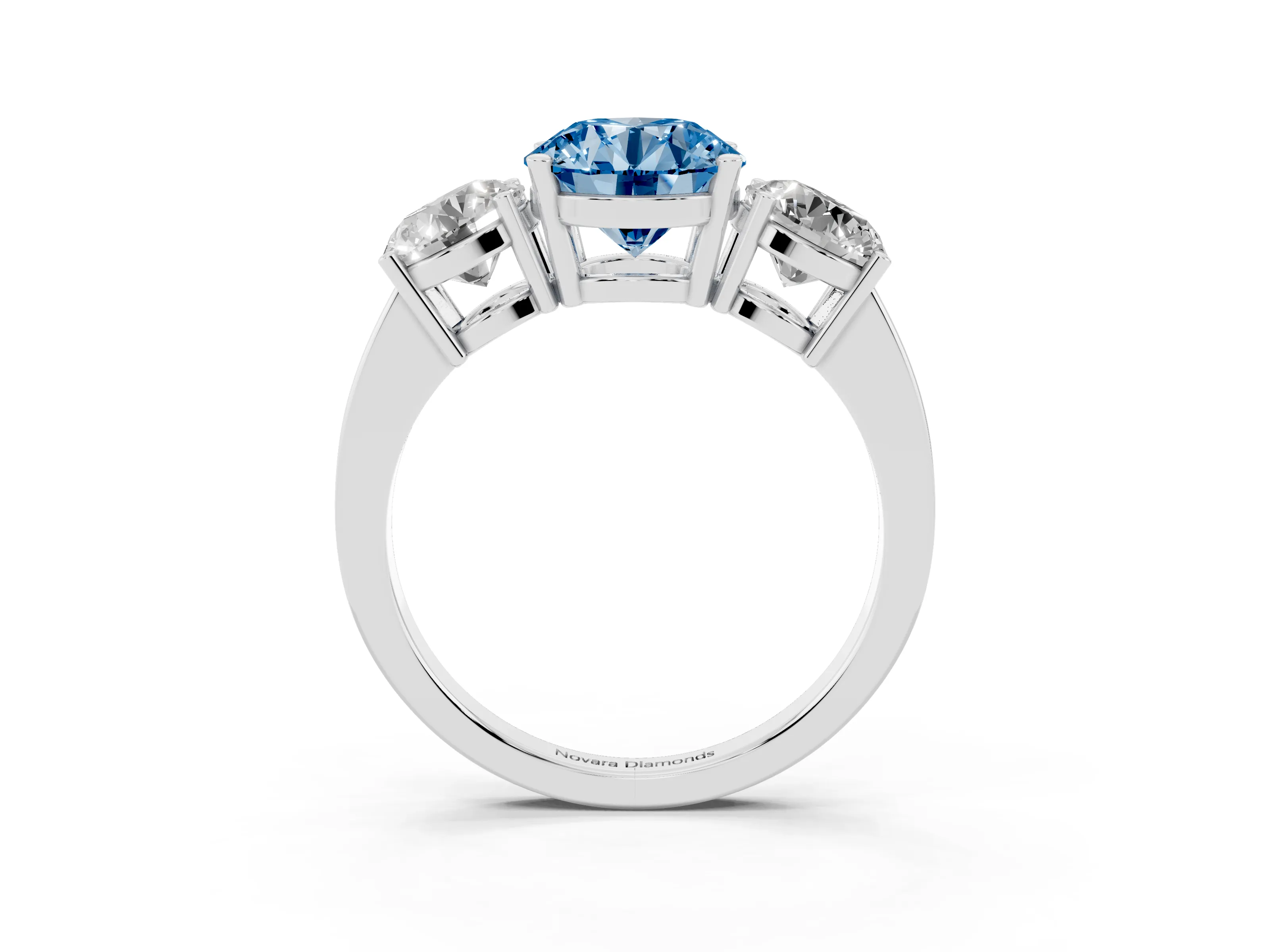 Fancy Blue Round Cut Diamond Three-Stone Engagement Ring Set in Silver with Flat Band