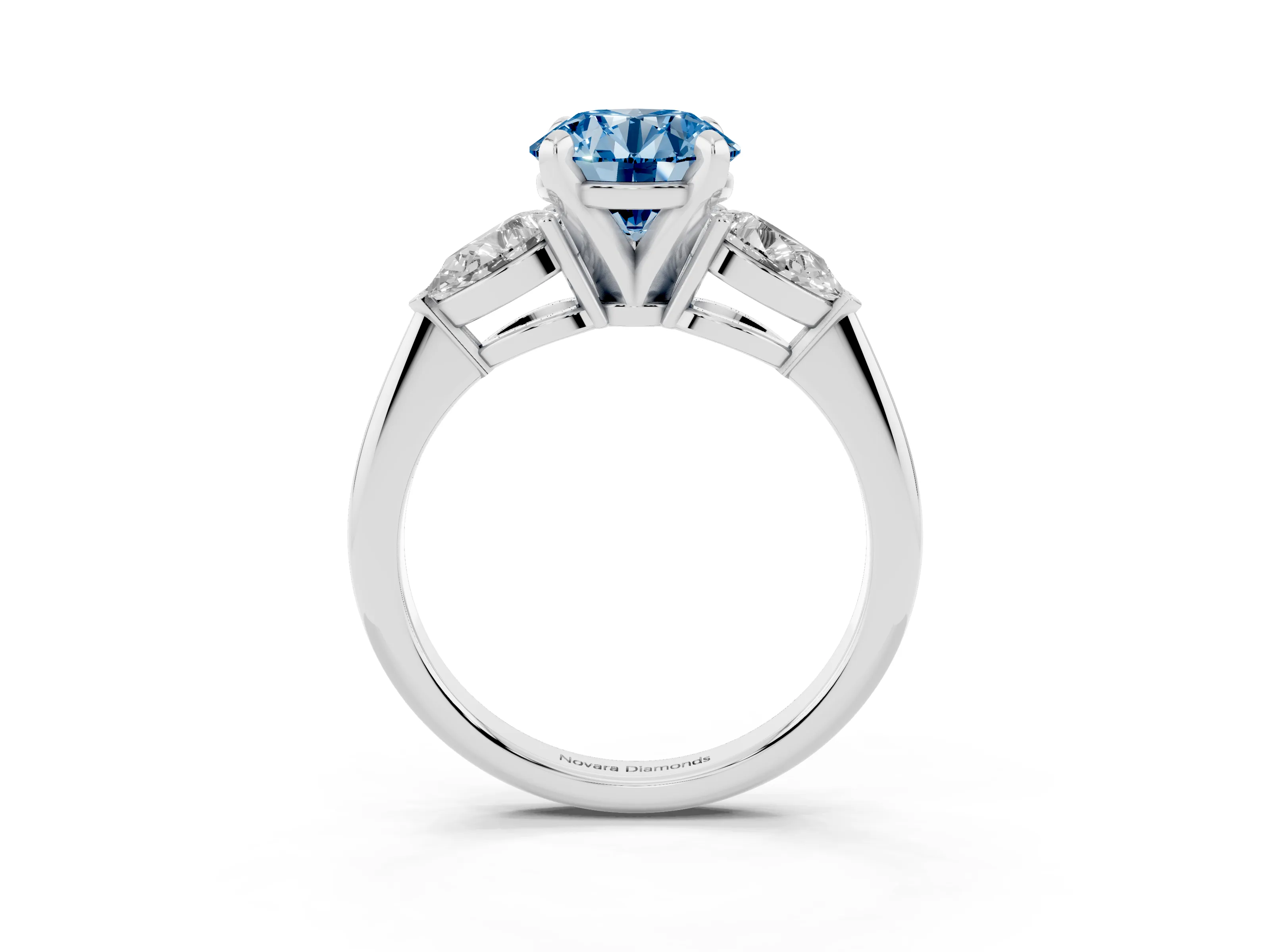 Fancy Blue Three-Stone Round Cut Diamond Ring Set in Silver with Pear Side Stones and Prong Setting