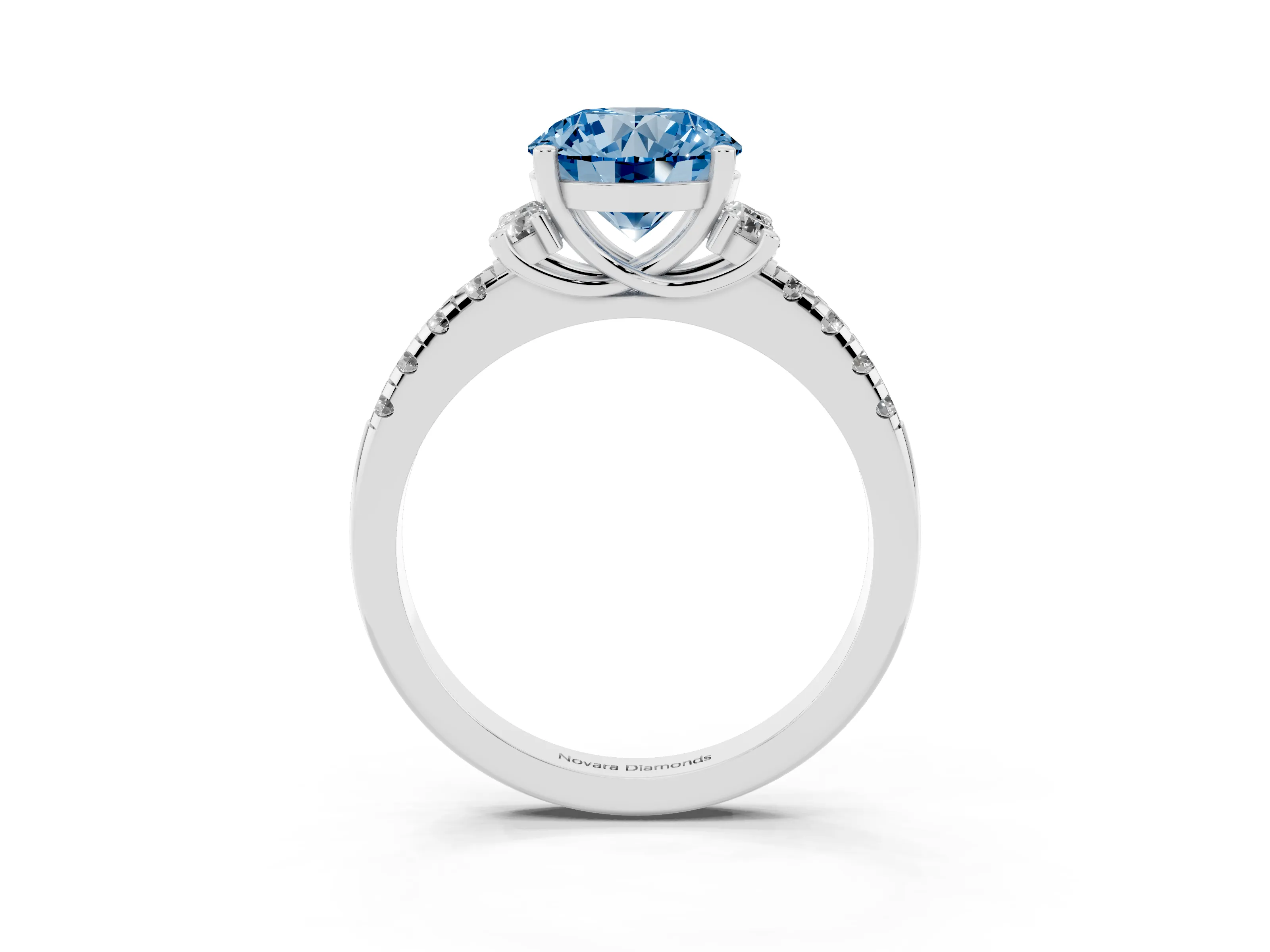 Fancy Blue Round Cut Diamond Three-Stone Pavé Ring Set in White gold with Prong Setting