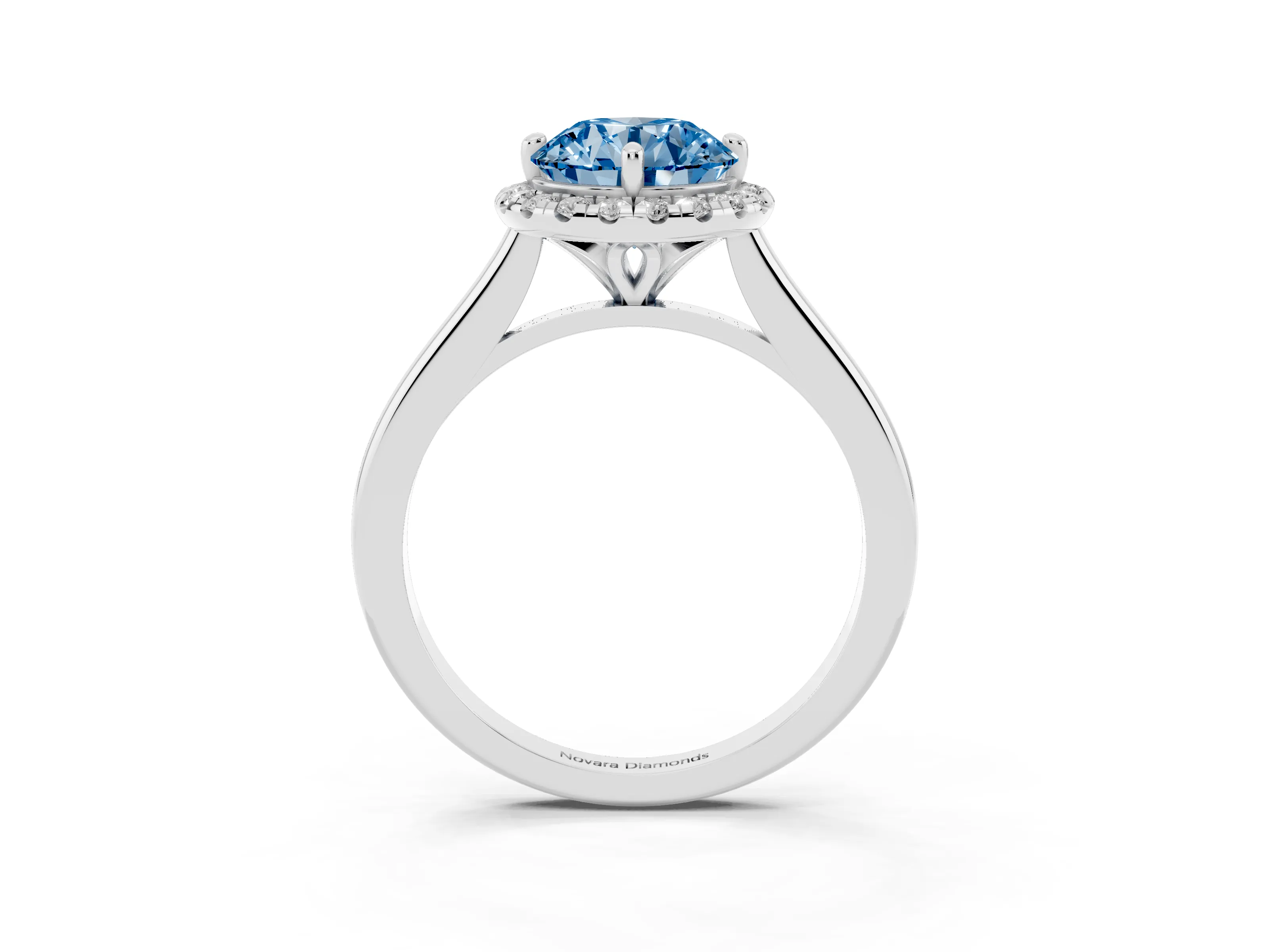 Fancy Blue Round Cut Diamond Halo Engagement Ring Set in Platinum with Pavé Band and Rising Shoulders