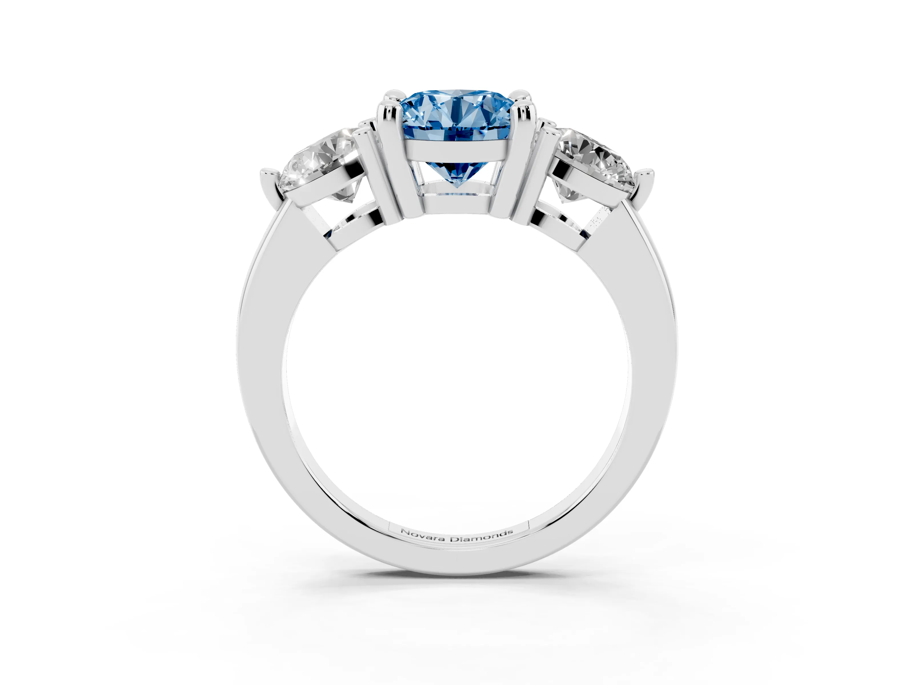 Fancy Blue Round Cut Diamond Three-Stone Ring Set in Platinum with Prong Setting and Classic Band